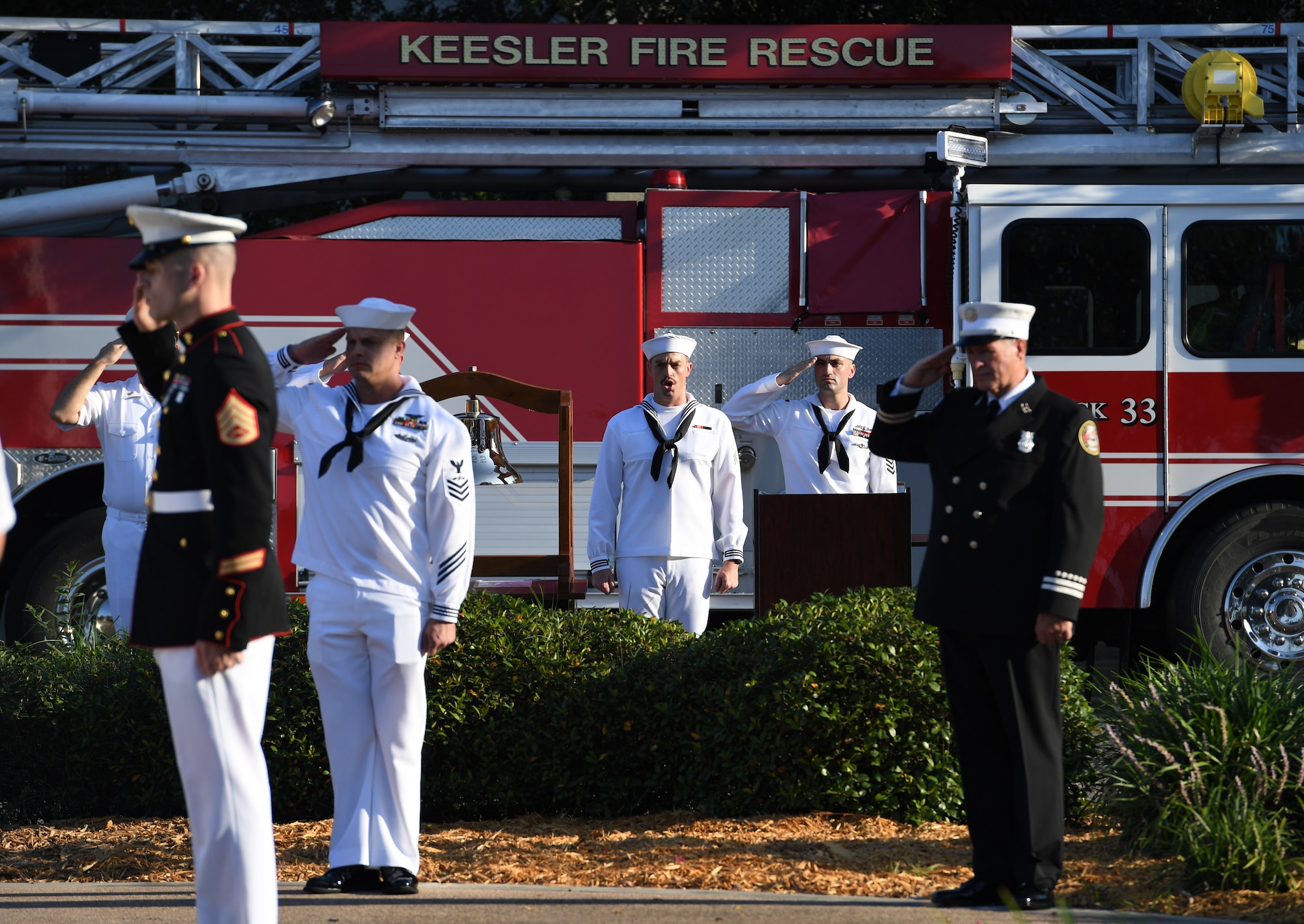 U.S. Navy Airman Apprentice James Greer, Center for Naval Aviation Technical Training Unit Keesler student, sings the national anthem during a 9/11 memorial ceremony hosted by CNATTU Keesler in front of the 81st Training Wing headquarters building on Keesler Air Force Base, Mississippi, Sept. 11, 2019. The event honored those who lost their lives during the 9/11 attacks. (U.S. Air Force photo by Kemberly Groue)