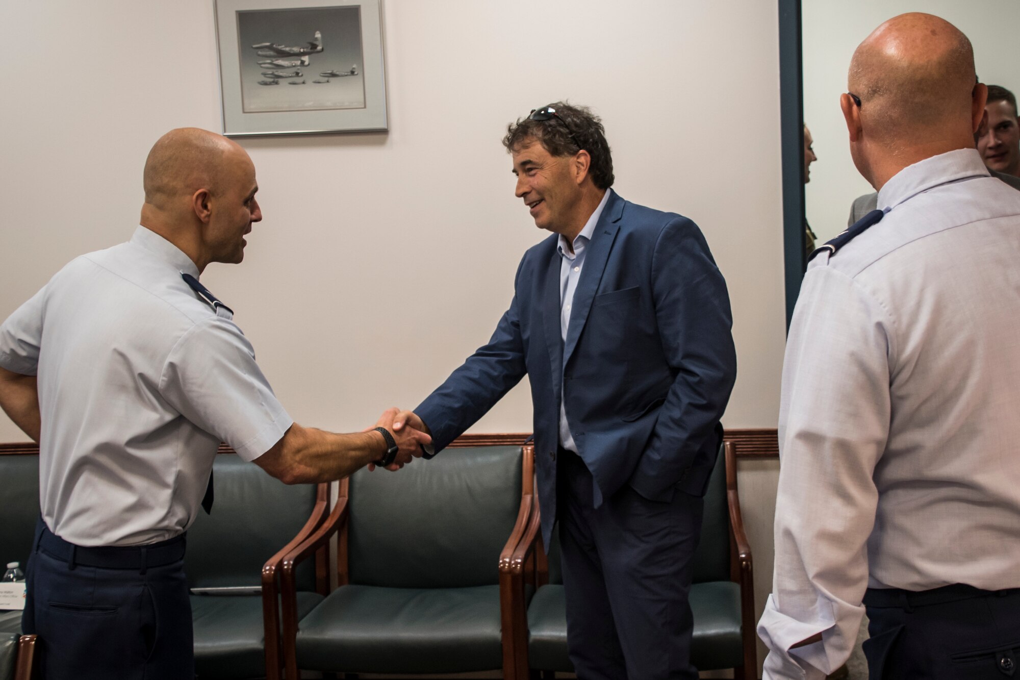 Photo of military member shaking hands with U.S. Representative from Ohio