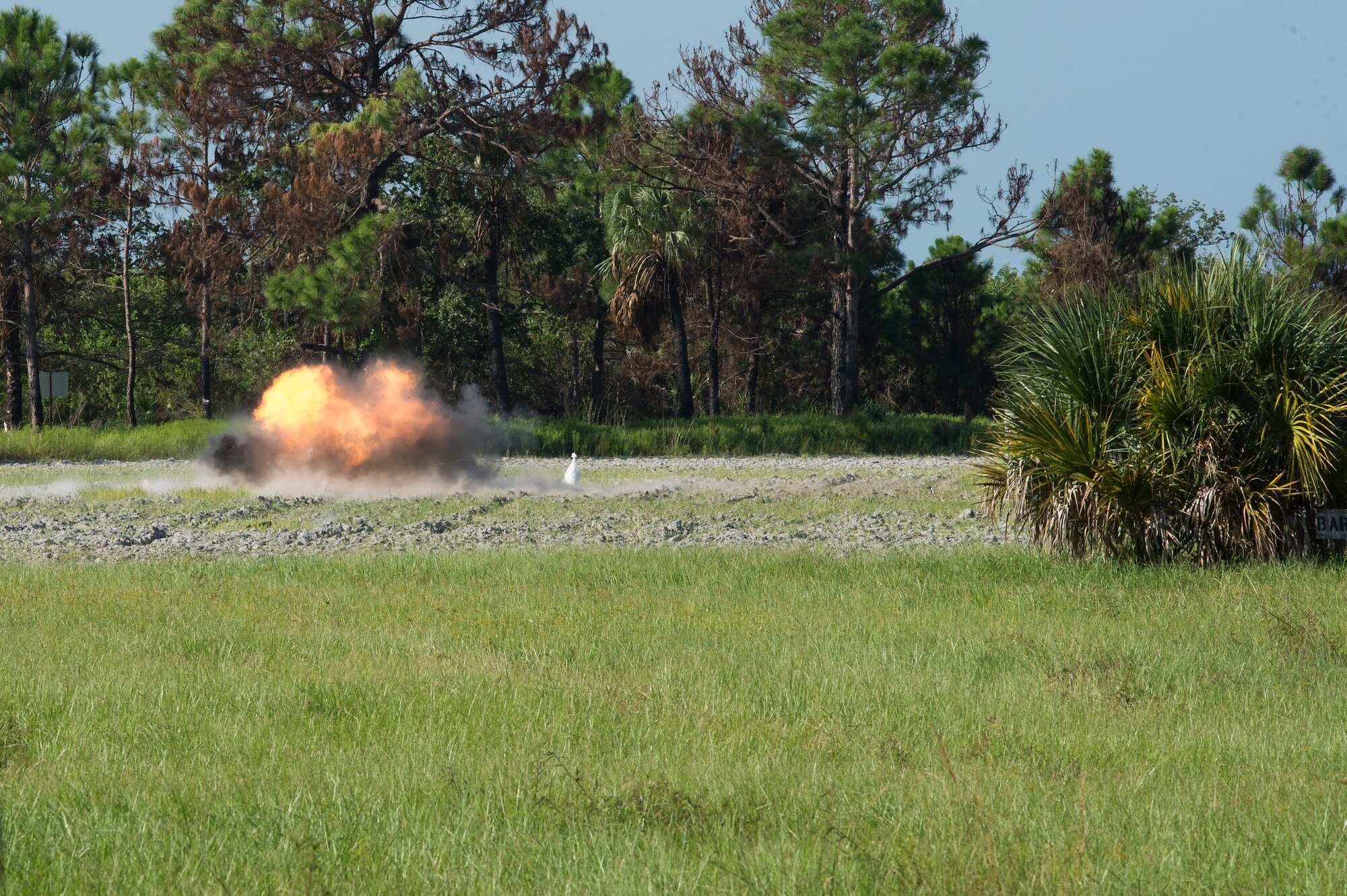 An explosive device detonates during a training organized by the 6th Civil Engineer Squadron Explosive Ordnance Disposal Flight for local Transportation Security Administration officers, Sept. 11, 2019, at MacDill Air Force Base, Fla.  (U.S. Air Force photo by Airman 1st Class Shannon Bowman)