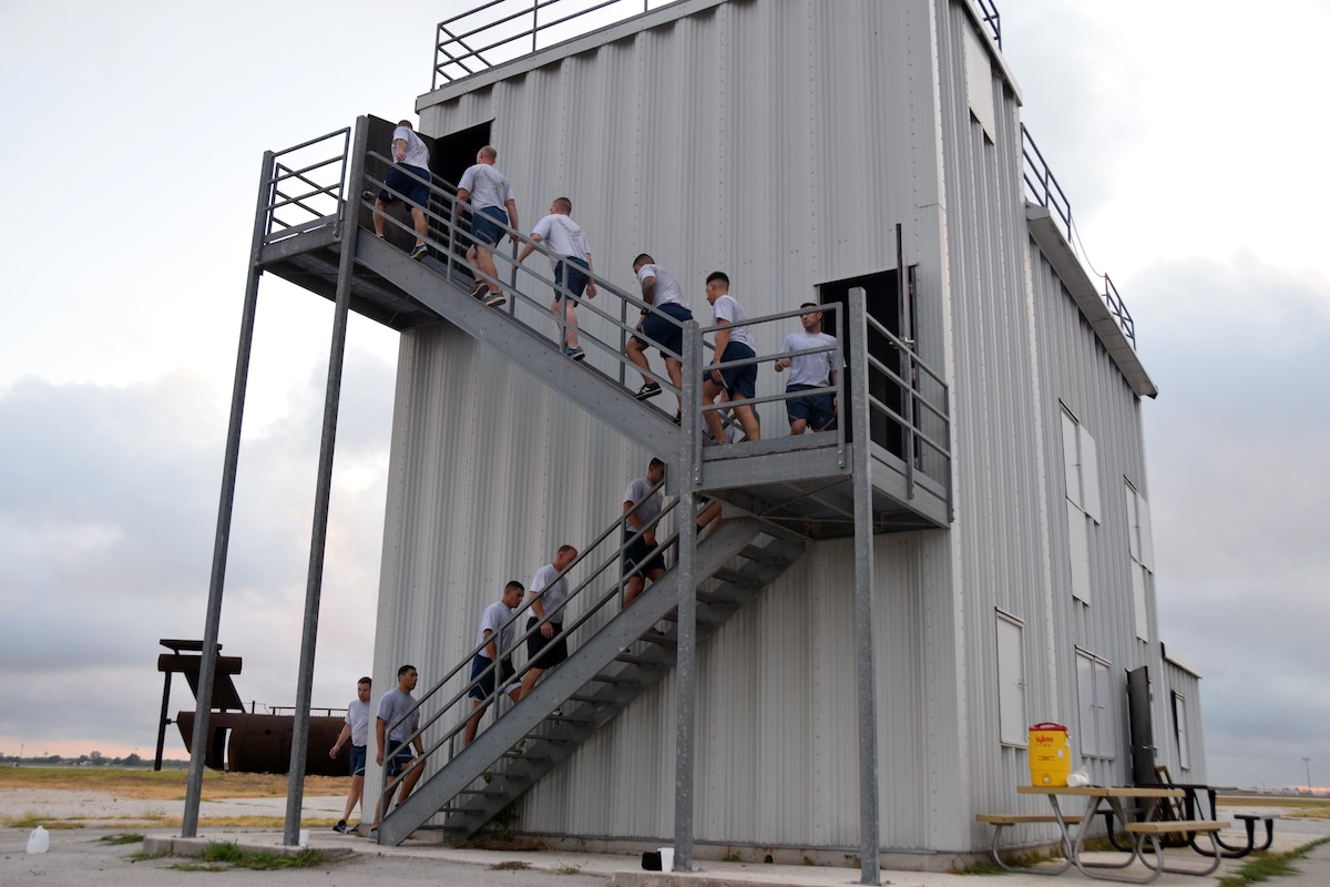 The 433rd Civil Engineer Squadron firefighters climb stairs of the fire training building to honor the first responders lost during the Sept. 11 attacks on the World Trade Center during a 9/11 Memorial Stair Climb Sept. 8, 2019 at Joint Base San Antonio-Lackland, TX.