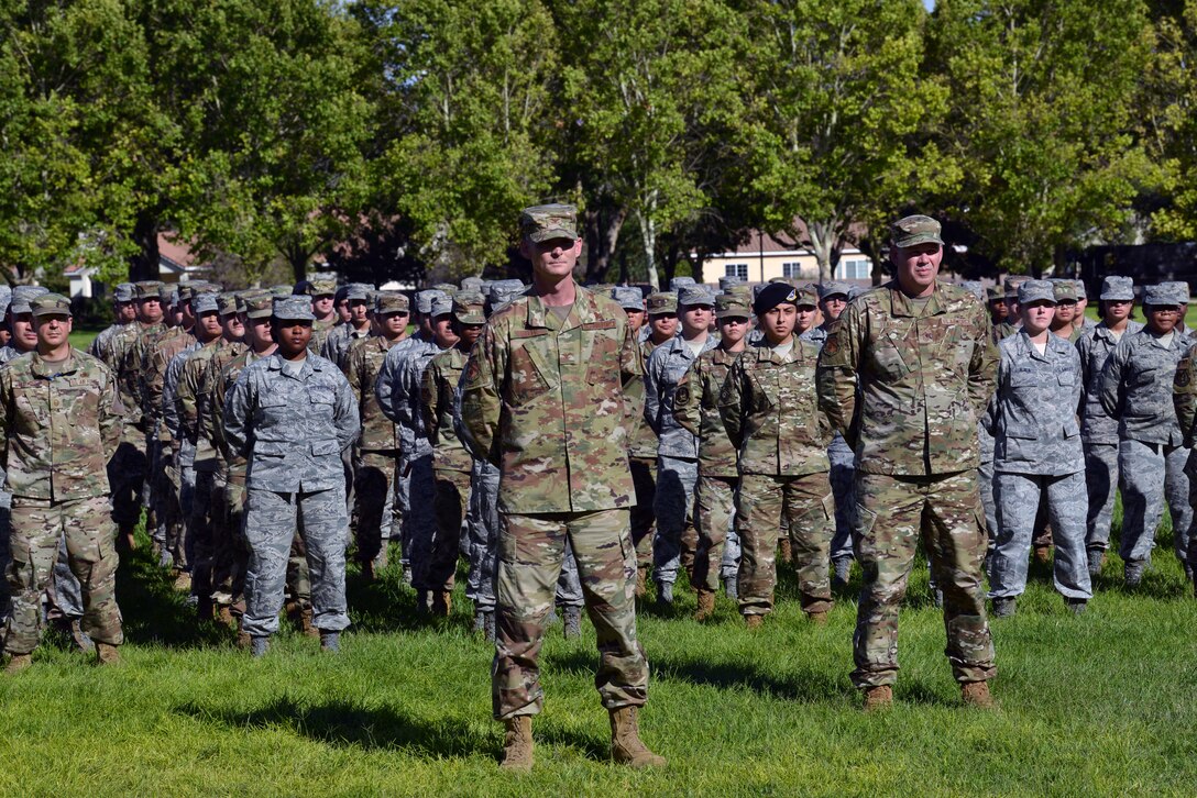 U.S. Air Force Col. David S. Miller, 377th Air Base Wing commander, stands in front of a Team Kirtland formation during a 9/11 retreat ceremony at Kirtland Air Force Base, N.M., Sept. 11, 2019. The retreat ceremony was held to honor and remember the nearly 3,000 people that died in the attacks on 9/11 and for those that have been killed in defense of the country since that day. (U.S. Air Force photo by Staff Sgt. Dylan Nuckolls/Released)