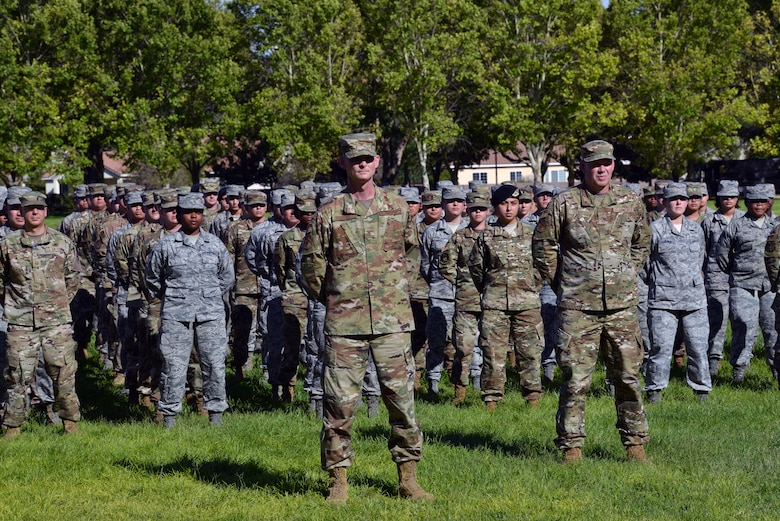 U.S. Air Force Col. David S. Miller, 377th Air Base Wing commander, stands in front of a Team Kirtland formation during a 9/11 retreat ceremony at Kirtland Air Force Base, N.M., Sept. 11, 2019. The retreat ceremony was held to honor and remember the nearly 3,000 people that died in the attacks on 9/11 and for those that have been killed in defense of the country since that day. (U.S. Air Force photo by Staff Sgt. Dylan Nuckolls/Released)