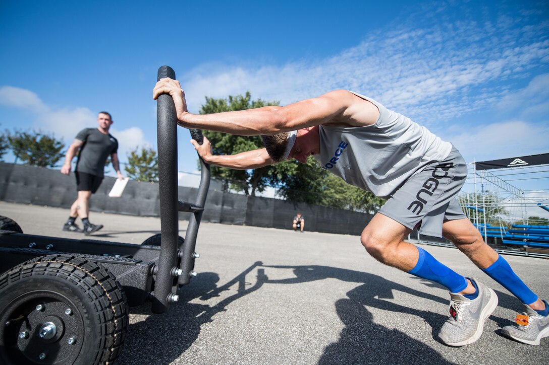 U.S. military members from the Air Force, Army, and Navy compete in the 2019 Air Force and Inter-Service Alpha Warrior Battles Sept. 12, 2019, at the Alpha Warrior Proving Grounds, Selma, Texas. The Air Force partnered with Alpha Warrior three years ago to deliver functional fitness training to Airmen and their families. (U.S. Air Force photo by Sarayuth Pinthong)