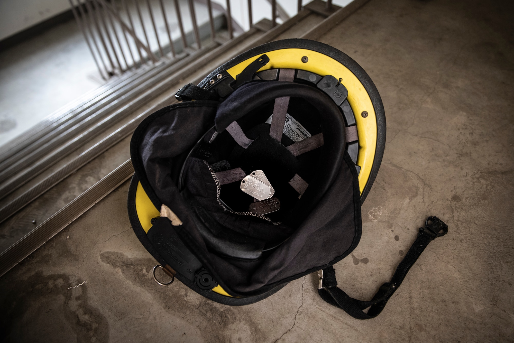 Dog tags sit inside a firefighter helmet during the 9/11 Tower Run, Sept. 11, 2019, at Yokota Air Base, Japan.