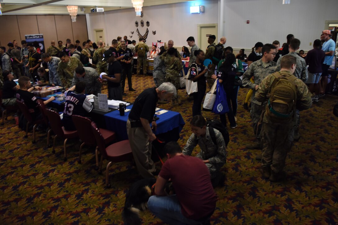 U.S. Air Force and Republic of Korea Air Force members check out different organizations at the Airmen 4 Airmen Club Fair during the Resilience Tactical Pause capstone event at Kunsan Air Base, Republic of Korea, Sept. 13, 2019. The event featured clubs for individuals looking to volunteer, develop professionally and join social organizations. (U.S. Air Force photo by Staff Sgt. Joshua Edwards)