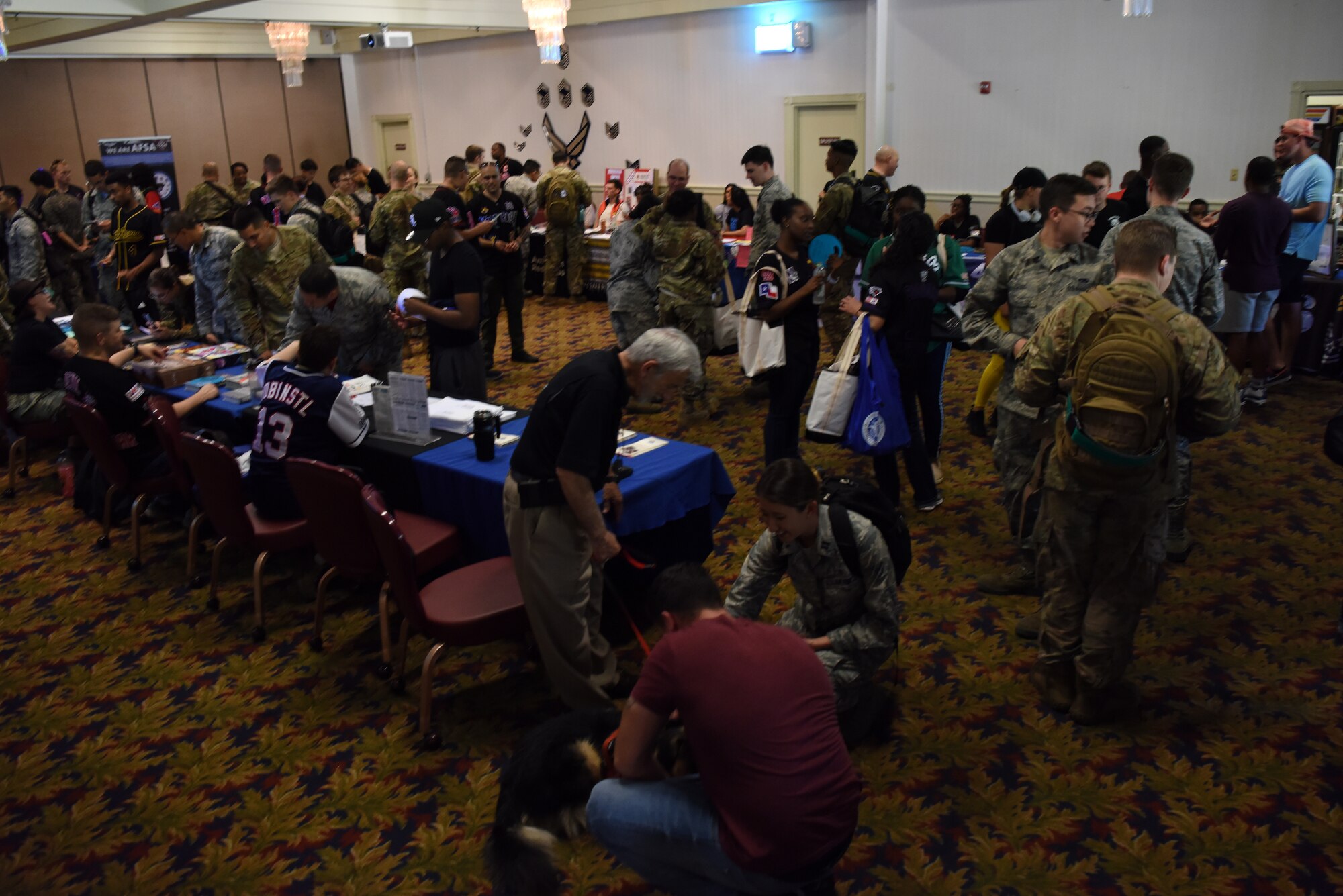 U.S. Air Force and Republic of Korea Air Force members check out different organizations at the Airmen 4 Airmen Club Fair during the Resilience Tactical Pause capstone event at Kunsan Air Base, Republic of Korea, Sept. 13, 2019. The event featured clubs for individuals looking to volunteer, develop professionally and join social organizations. (U.S. Air Force photo by Staff Sgt. Joshua Edwards)