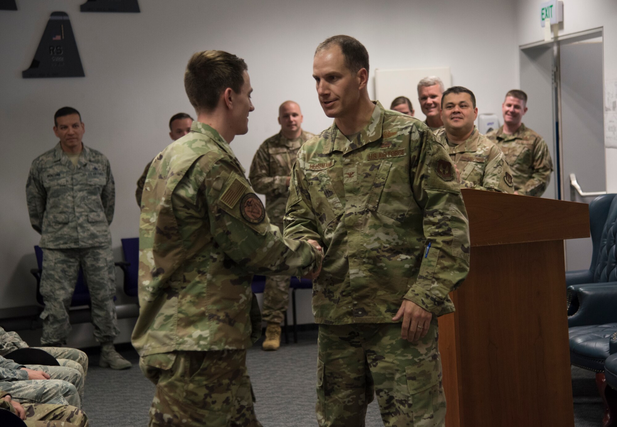 U.S. Air Force Col. Matthew S. Husemann, 86th Airlift Wing vice commander, congratulates Staff Sgt. Spencer Koepp, a C-130 aircraft maintenance craftsman with the 86th Aircraft Maintenance Squadron, on being named Airlifter of the Week at Ramstein Air Base, Germany, Sept. 12, 2019.