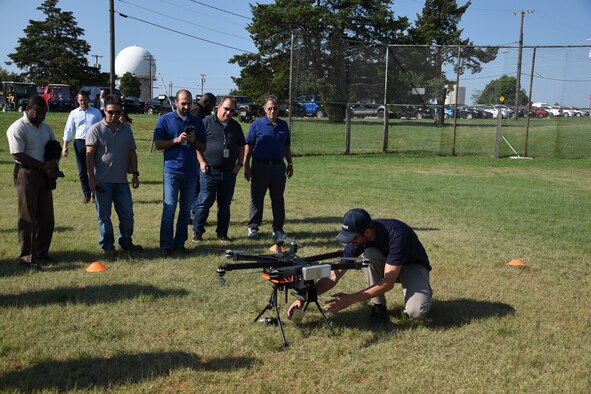 An image of a technician securing a drone following a demonstration.
