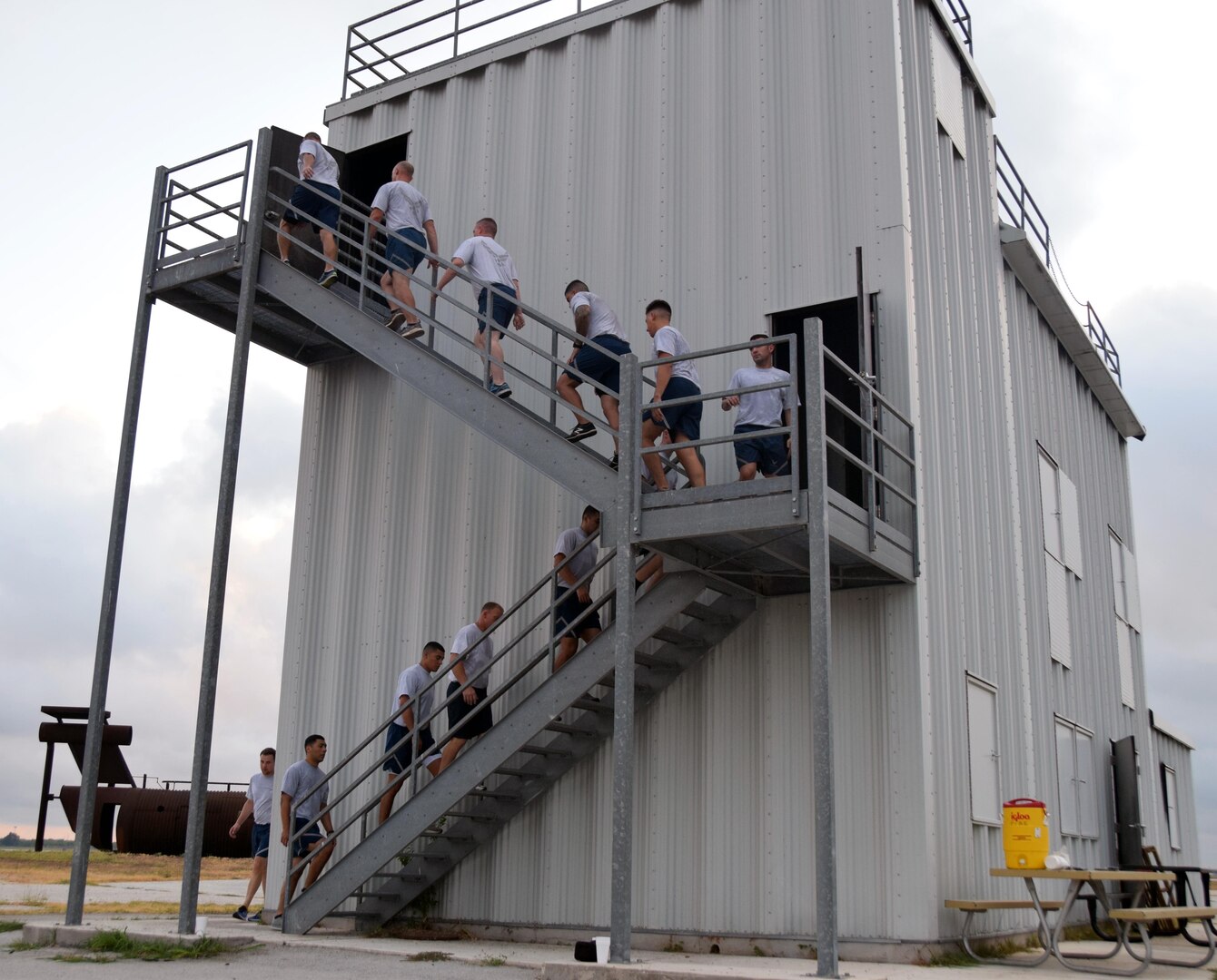The 433rd Civil Engineer Squadron firefighters climb stairs of the fire training building to honor the first responders lost during the Sept. 11, 2001 attacks on the World Trade Center during a 9/11 Memorial Stair Climb Sept. 8, 2019 at Joint Base San Antonio-Lackland. The firefighters climbed stairs 55 times to equal the 110 floors of World Trade Center twin tower buildings.