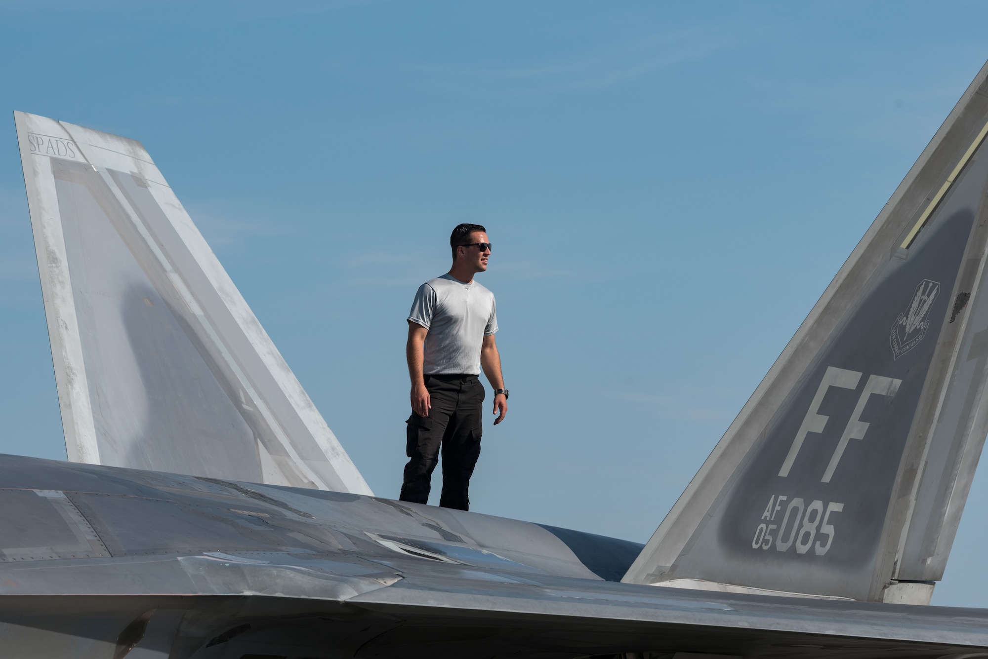 Staff Sgt. Zach Zistl, F-22 Raptor dedicated crew chief, performs a postflight inspection Sept. 12, 2019, at Dover Air Force Base, Del. Zistl, a member of the F-22 demonstration team from Joint Base Langley-Eustis, Va., arrived here for the Thunder Over Dover 2019 open house and air show. (U.S. Air Force photo by Roland Balik)