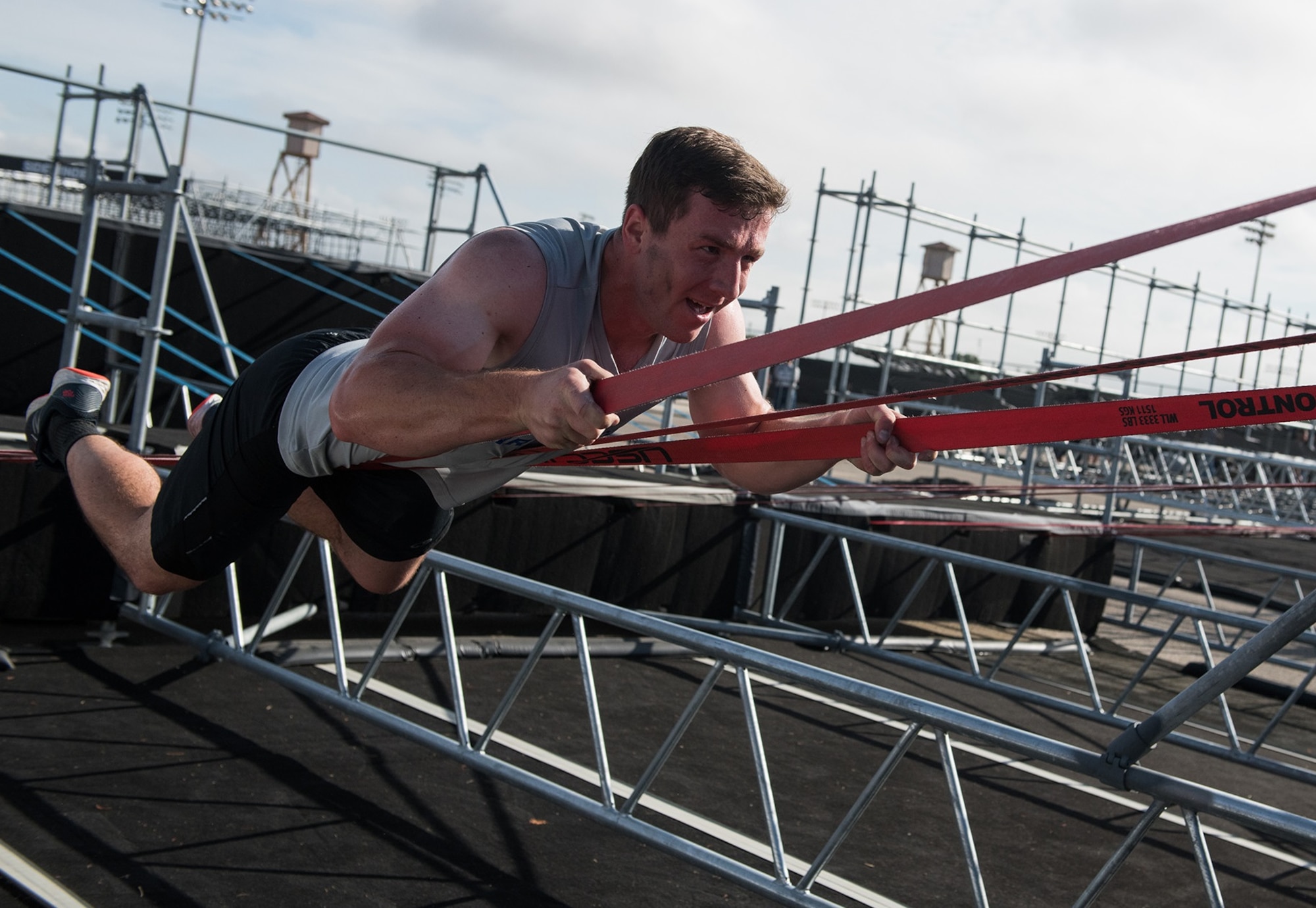 2nd Lt. Jesse Montgomery takes on an obstacle during the 2019 Air Force Alpha Warrior Final Battle at Retama Park, Selma, Texas, Sept. 12, 2019. Air Force, Army and Navy military athletes competed against each other to determine the top three men and three women for each service. Those athletes make up the service teams that will go against each other during the 2019 Inter-Service Battle Sept. 14 at Retama. The Air Force partnered with Alpha Warrior three years ago to deliver functional fitness training to Airmen and their families.
