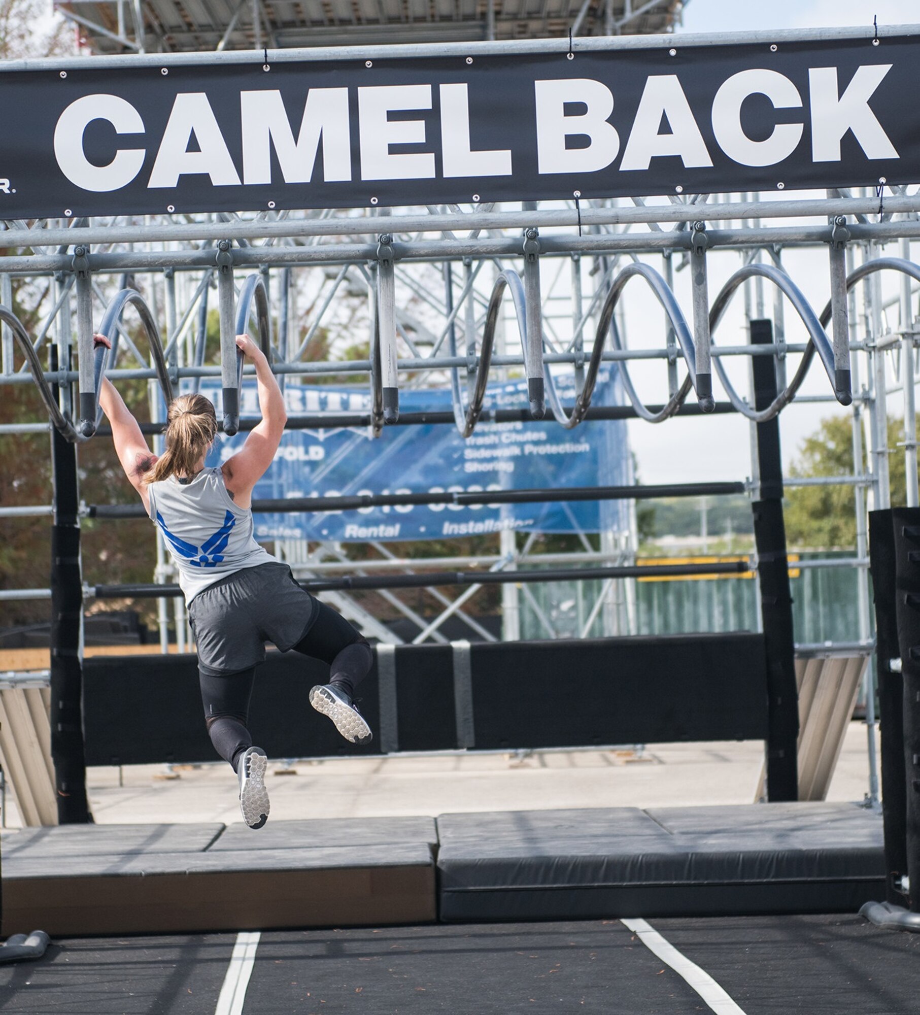 Staff Sgt. Tiffanie Sawatzke takes on the camel back obstacle during the 2019 Air Force Alpha Warrior Final Battle at Retama Park, Selma, Texas, Sept. 12, 2019. Air Force, Army and Navy military athletes competed against each other to determine the top three men and three women for each service. Those athletes make up the service teams that will go against each other during the 2019 Inter-Service Battle Sept. 14 at Retama. The Air Force partnered with Alpha Warrior three years ago to deliver functional fitness training to Airmen and their families.