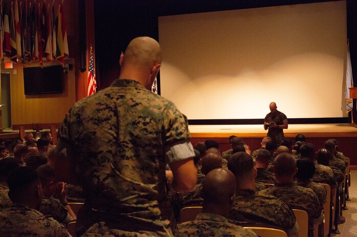 Sergeant Major of the Marine Corps Sgt. Maj. Troy E. Black writes down a Marine’s question during a town hall with Marines and Sailors assigned to U.S. Marine Corps Forces Command (MARFORCOM) Sept. 9, 2019, at Joint Forces Staff College on Naval Support Activity Hampton Roads, Norfolk, Virginia. Black visited MARFORCOM during a tour of Marine Corps installations to discuss the Commandant’s Planning Guidance and the future of warfare, and to answer Marines’ questions. (U.S. Marine Corps photo by Sgt. Jessika Braden/Released)
