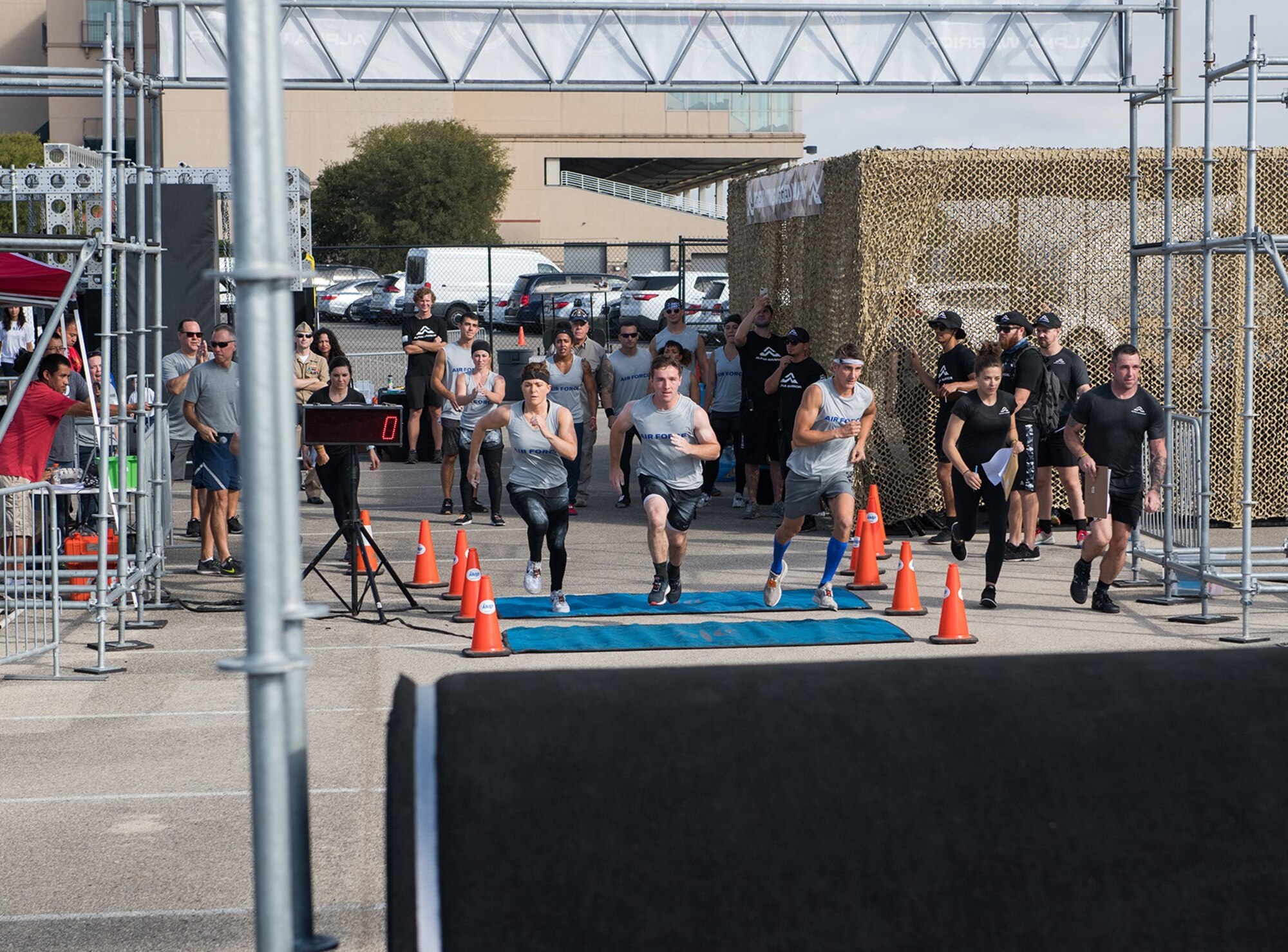 U.S. military members from the Air Force, Army, and Navy compete in the 2019 Air Force and Inter-Service Alpha Warrior Battles Sept. 12, 2019, at the Alpha Warrior Proving Grounds, Selma, Texas. The Air Force partnered with Alpha Warrior three years ago to deliver functional fitness training to Airmen and their families.