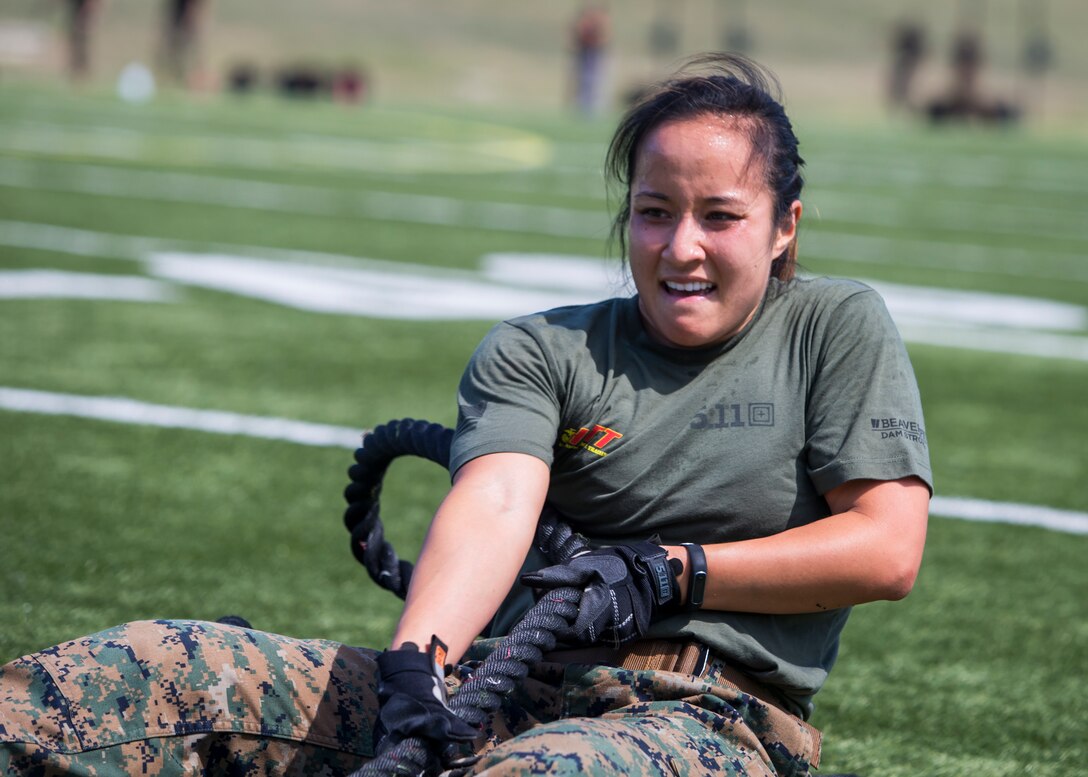 Capt. Stefanie Allen, Marine Corps Base Quantico, Va., competes in the fourth challenge of the High Intensity Tactical Training Championship at Butler Stadium aboard Marine Corps Base Quantico, Va., Sep. 10, 2019. The fourth challenge consisted of going over the BeaverFit Assault Rig, and race through an obstacle course that has various sprints, crawls, tire flips, sled drags, farmer’s carries, and others totaling over six-hundred yards.