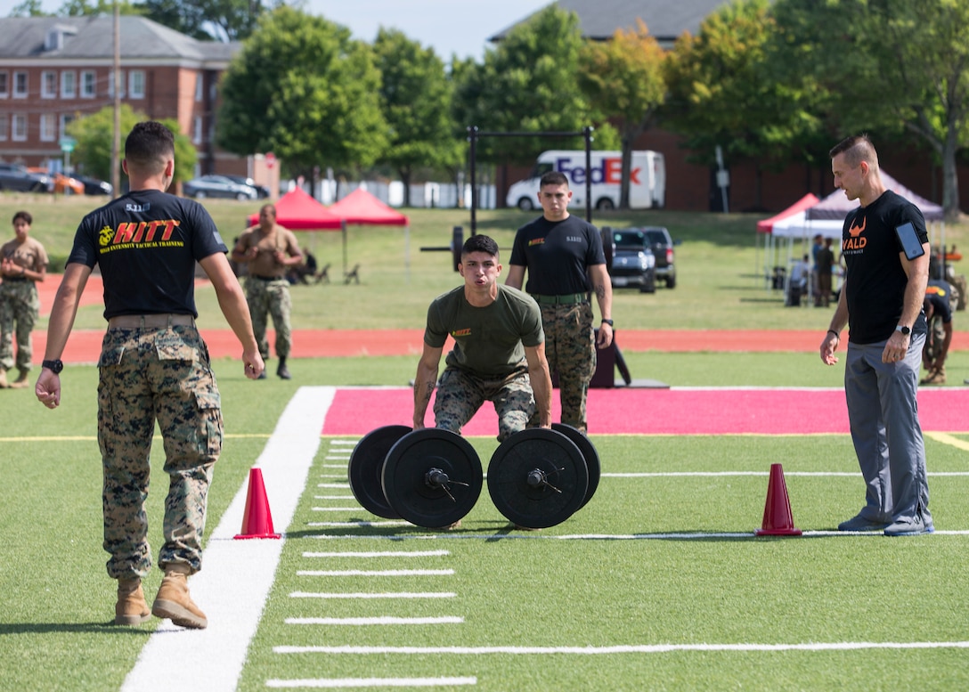 A U.S. Marine competes in the fourth challenge of the High Intensity Tactical Training Championship at Butler Stadium aboard Marine Corps Base Quantico, Va., Sep. 10, 2019. The fourth challenge consisted of going over the BeaverFit Assault Rig, and race through an obstacle course that has various sprints, crawls, tire flips, sled drags, farmer’s carries, and others totaling over six-hundred yards.