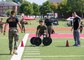 A U.S. Marine competes in the fourth challenge of the High Intensity Tactical Training Championship at Butler Stadium aboard Marine Corps Base Quantico, Va., Sep. 10, 2019. The fourth challenge consisted of going over the BeaverFit Assault Rig, and race through an obstacle course that has various sprints, crawls, tire flips, sled drags, farmer’s carries, and others totaling over six-hundred yards.