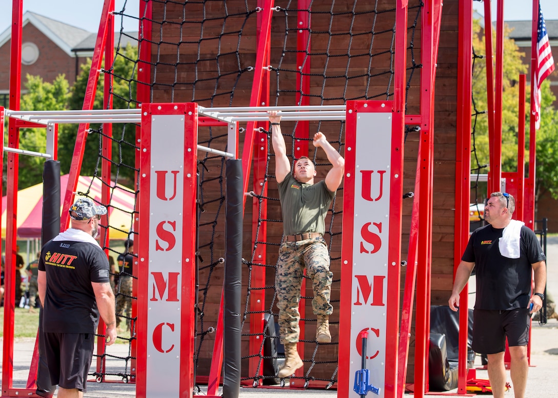 A U.S. Marine competes in the fourth challenge of the High Intensity Tactical Training Championship at Butler Stadium aboard Marine Corps Base Quantico, Va., Sep. 10, 2019. The fourth challenge consisted of going over the BeaverFit Assault Rig, and race through an obstacle course that has various sprints, crawls, tire flips, sled drags, farmer’s carries, and others totaling over six-hundred yards.