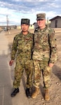 Pfc. Kyle Brennan poses with a member of the Japanese Ground Self-Defense during Rising Thunder 19.