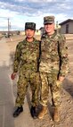 Pfc. Kyle Brennan poses with a member of the Japanese Ground Self-Defense during Rising Thunder 19.