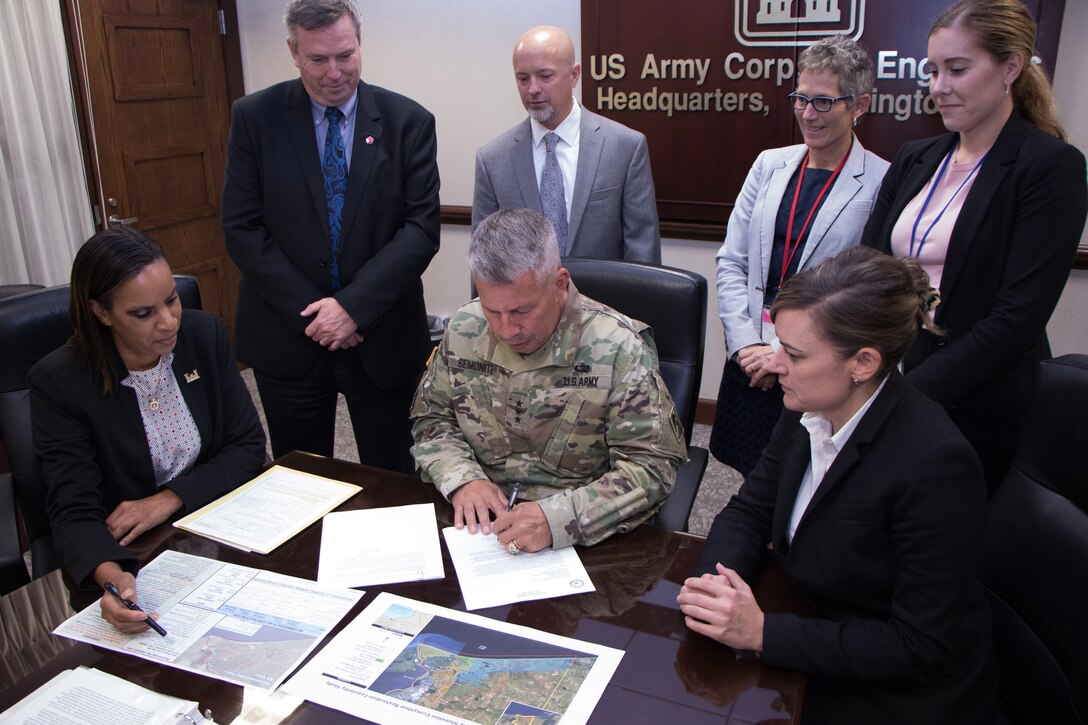 Lt. Gen. Todd T. Semonite, USACE Commanding General and 54th U.S. Army Chief of Engineers, signed the recommended plan to support efforts to improve, preserve and sustain ecological resources along the Texas coast Sept. 12, 2019. The signing of the Jefferson County Ecosystem Restoration Project Chief's Report progresses the project to Congress for authorization. (Photo by Philipp Tintner)
