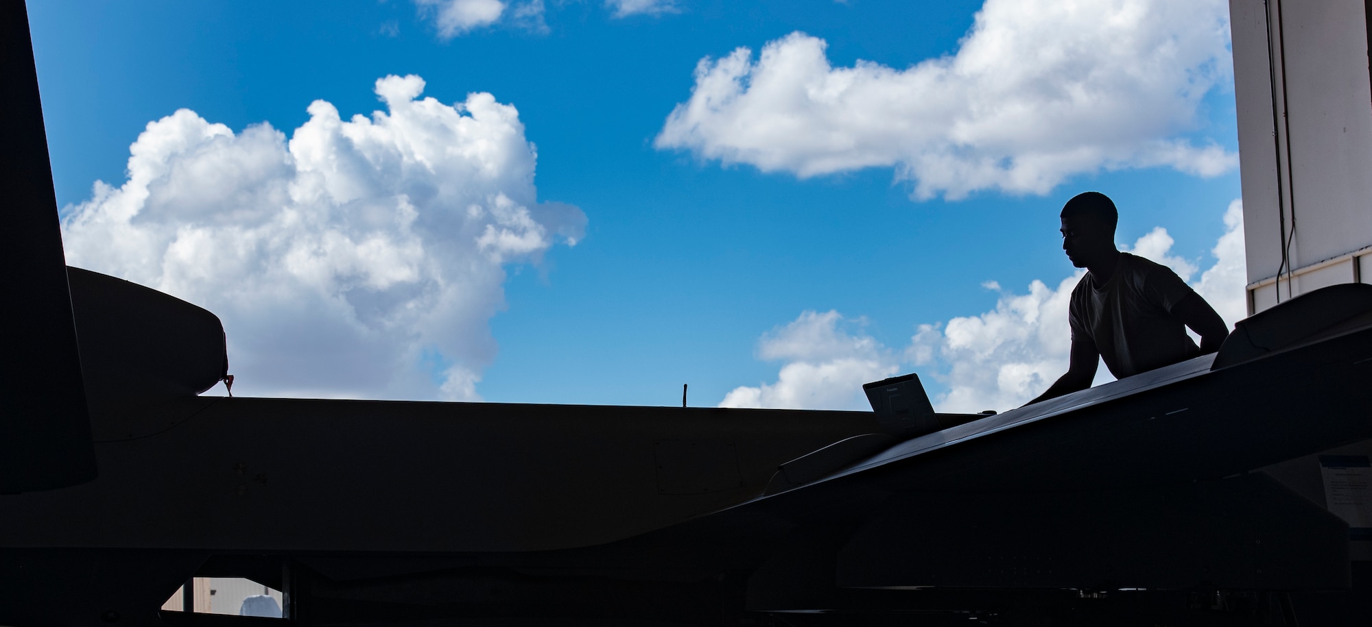 Airman Terrell Mitchell, 362nd Training Wing MQ-9 crew chief apprentice course student, checks a wing pin panel on an MQ-9 Reaper at Sheppard Air Force Base, Texas, Sept. 9, 2019. Mitchell is performing a security check, which are performed before and after every flight to make sure every part is in place so the Reaper Drone can complete it's job. (U.S. Air Force photo by Airman 1st Class Pedro Tenorio)