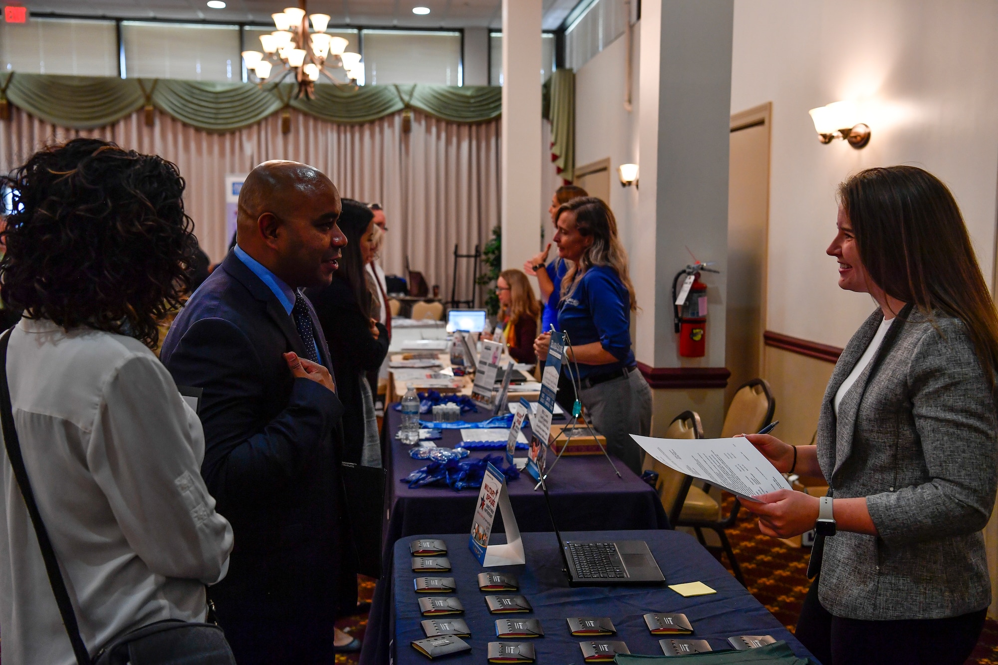 An employer interacts with a potential employee and discusses the company and their role in society during the Hiring our Heroes Military Spouse Hiring Event on Joint Base McGuire-Dix-Lakehurst, New Jersey, Sept. 12, 2019. During the event, more than 175 spouses received information on job opportunities, applied for employment and received professional headshots for their LinkedIn accounts. Since its creation, more than 31,000 veterans and military spouses have obtained employment opportunities through Hiring our Heroes events.