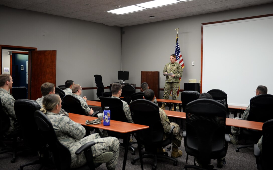 Tech. Sgt. Stacy Klein, 14th Operational Medical Readiness Squadron’s Aerospace and Operational Physiology Flight section chief, explains the details of an exercise to participants Sept. 3, 2019, on Columbus Air Force Base, Miss. The exercise began as a chamber simulation inside the Hyperbaric Chamber Room with AOP Airmen using procedures utilized in training and a handful of participants tasked with chamber reactions. (U.S. Air Force photo by Airman 1st Class Hannah Bean)