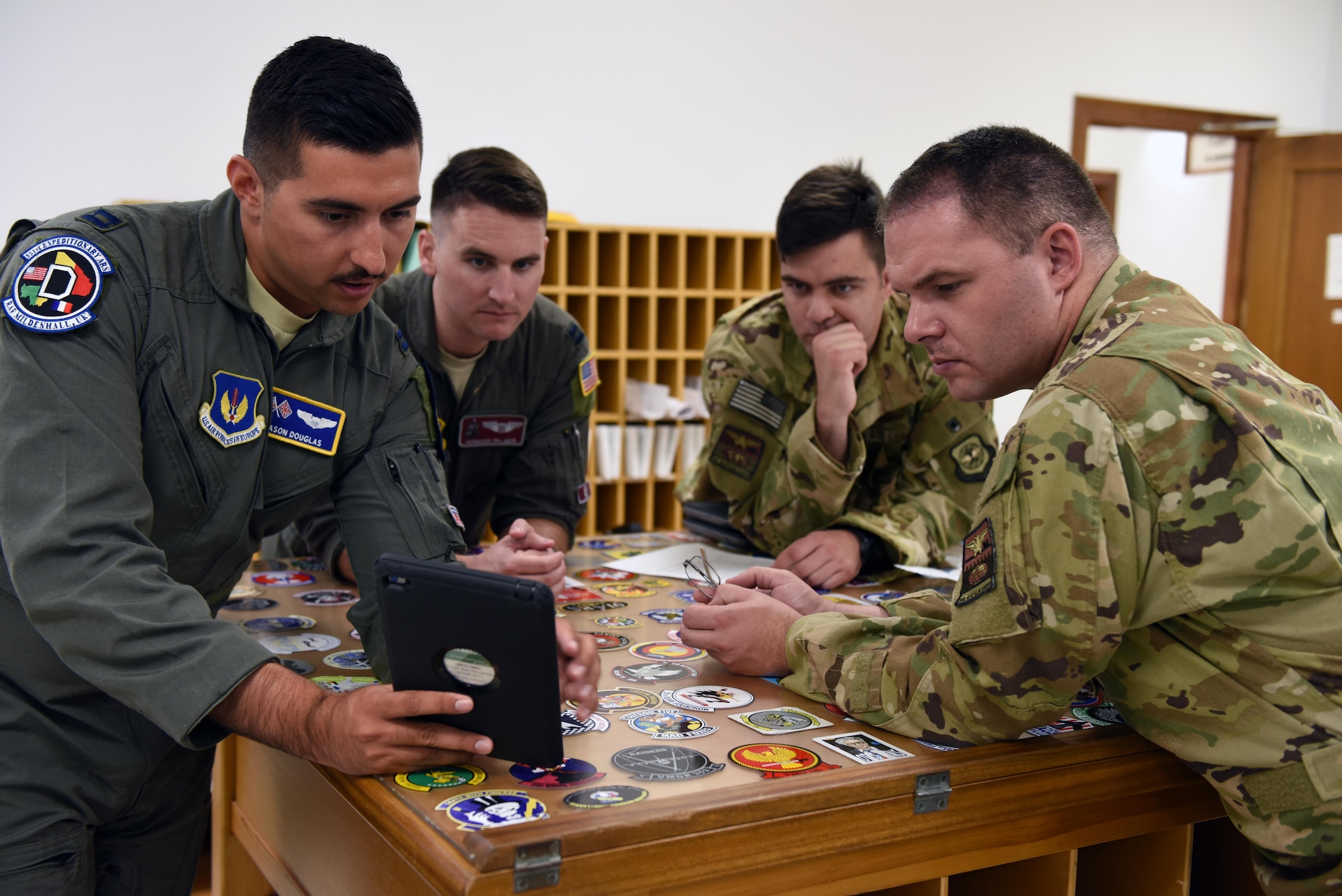 U.S. Air Force Capt. Jason Douglas, 351st Expeditionary Air Refueling Squadron KC-135 Stratotanker pilot, performs turnover training with 384th ARS aircrew members from Fairchild Air Force Base at Moron Air Base, Spain, Sept. 8, 2019. The 384th ARS was deployed in support of Operation Juniper Micron, a counterterrorism operation stemming from a long-standing relationship between the U.S. and French governments dating back to 2013. (U.S. Air Force photo by Staff Sgt. Nick J. Daniello)