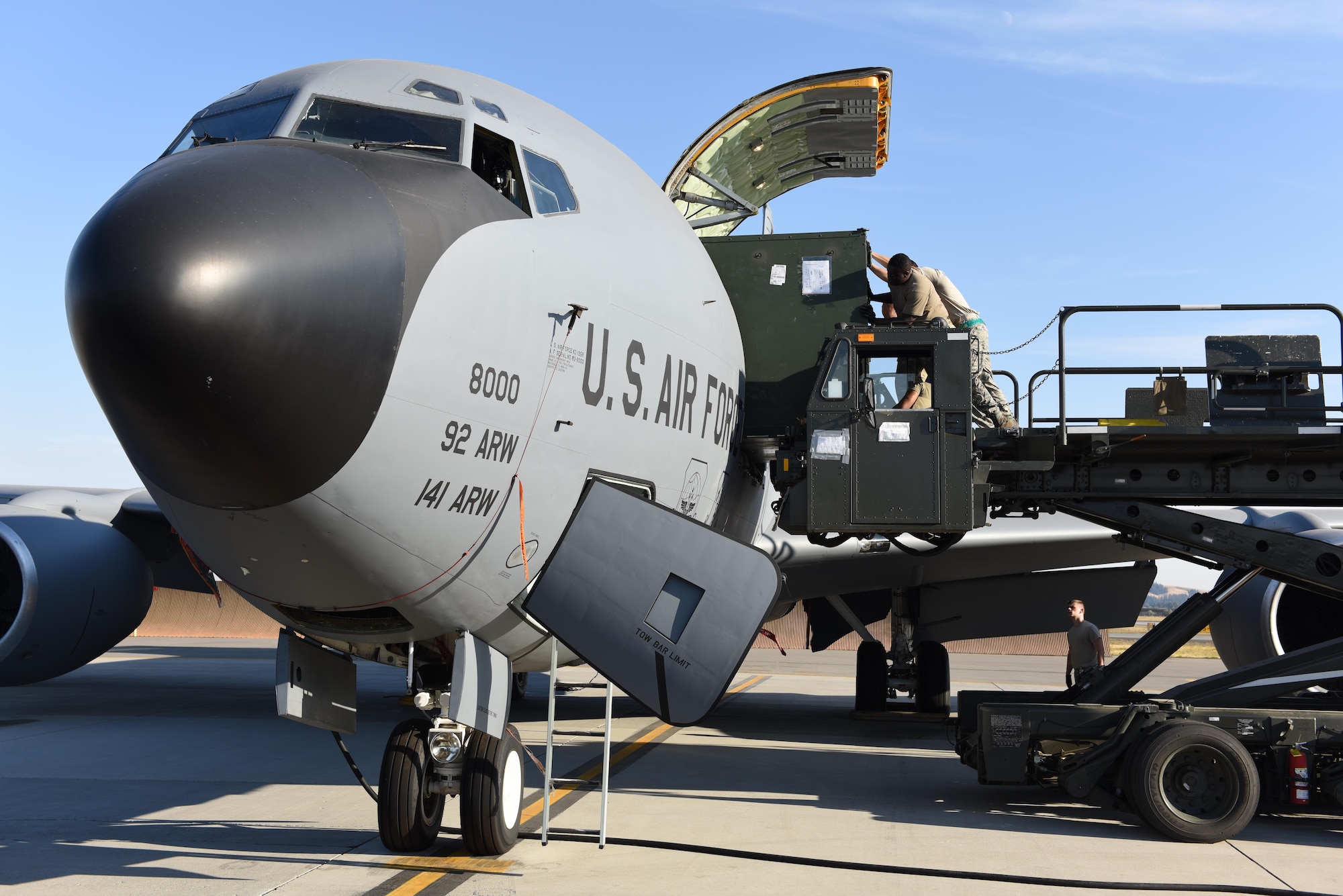 92nd Logistics Readiness Squadron Airmen load cargo onto a KC-135 Stratotanker at Fairchild Air Force Base, Washington, in preparation of supporting Operation Juniper Micron Sept. 2019.