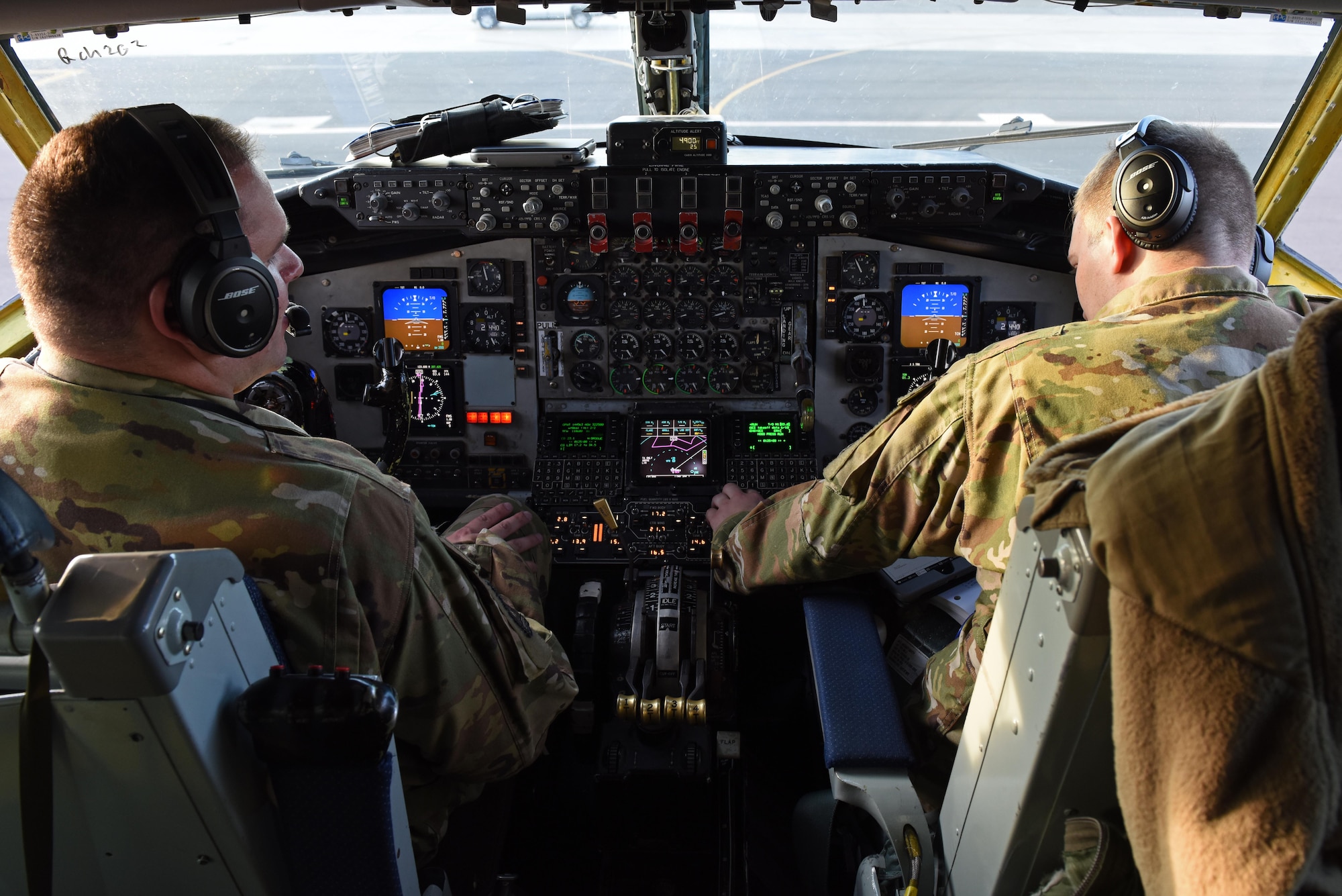 U.S. Air Force Capt. Justin Medlen, Operation Juniper Micron 384th Air Refueling Squadron aircraft commander (left) and 1st Lt. Colton Currier, 384th ARS co-pilot, prepare for take-off from Fairchild Air Force Base, Washington, in preparation to support Operation Juniper Micron Sept. 2019.