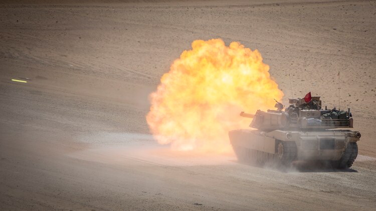 An M1A1 Abrams tank, attached to India Company, Battalion Landing Team 3/5, 11th Marine Expeditionary Unit, fires its main gun during a live-fire exercise. The Boxer Amphibious Ready Group and 11th MEU are deployed to the U.S. 5th Fleet area of operations in support of naval operations to ensure maritime stability and security in the Central Region, connecting the Mediterranean and the Pacific through the Western Indian Ocean and three strategic choke points.
