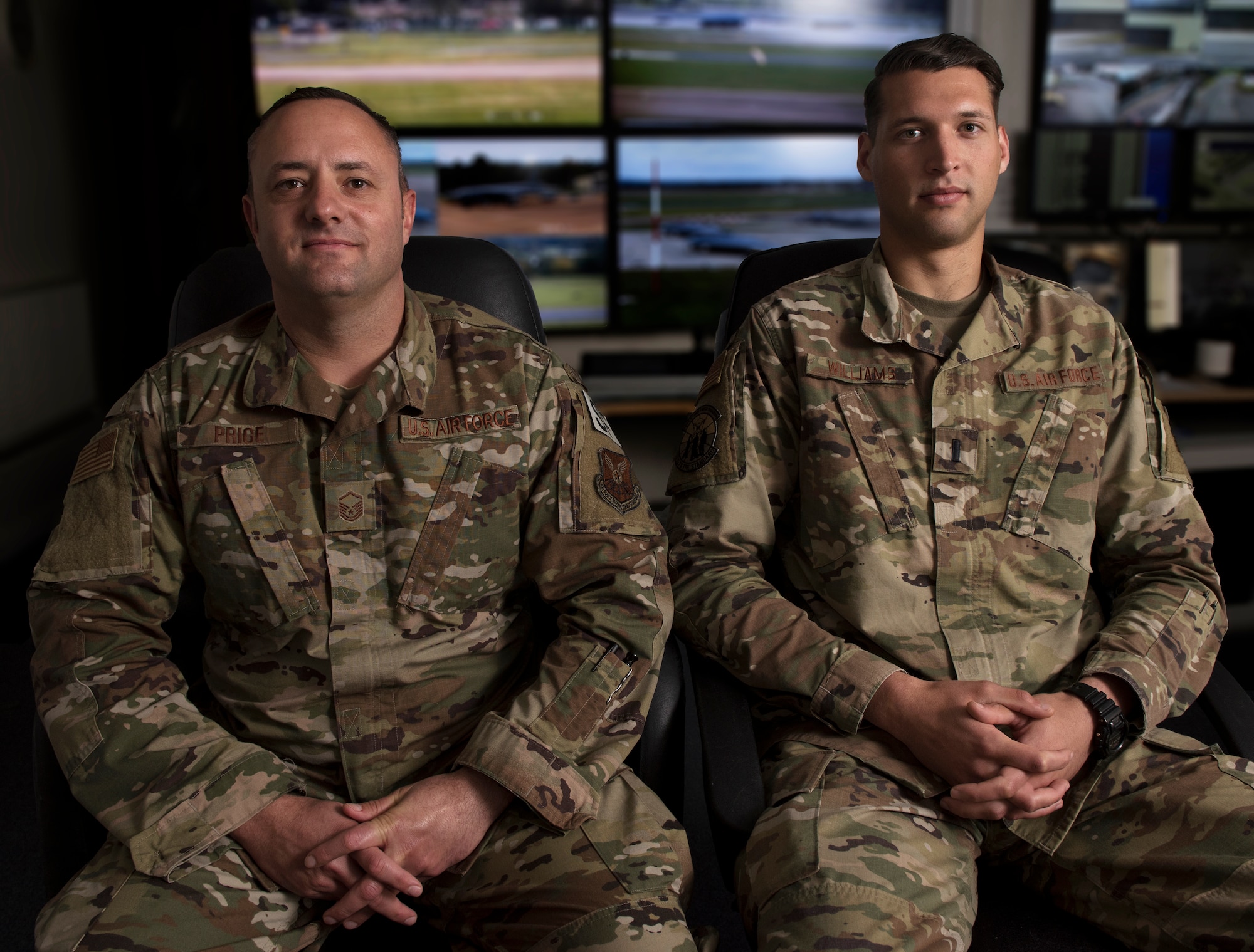 Master Sgt. Lawrence Price, assigned to the 7th Security Forces Squadron at Dyess Air Force Base, Texas, poses for a portrait with 1st Lt. Andrew Williams, assigned to the 509th SFS at Whiteman Air Force Base, Missouri, on Sept. 10, 2019, at Royal Air Force Fairford, England. Price and Williams have collaborated as the U.S.  SF leadership team at RAF Fairford, establishing processes and procedures for the Bomber Task Force they deployed in support of as well as future SF elements that wll rotate through the isntallation. Price and Williams lead the BTF SF element, which comprises defenders from Whiteman AFB, Dyess AFB, Barksdale Air Force Base, Louisiana, as well as Ramstein and Spangdahlem Air Bases in Germany. (U.S. Air Force photo by Staff Sgt. Kayla White)