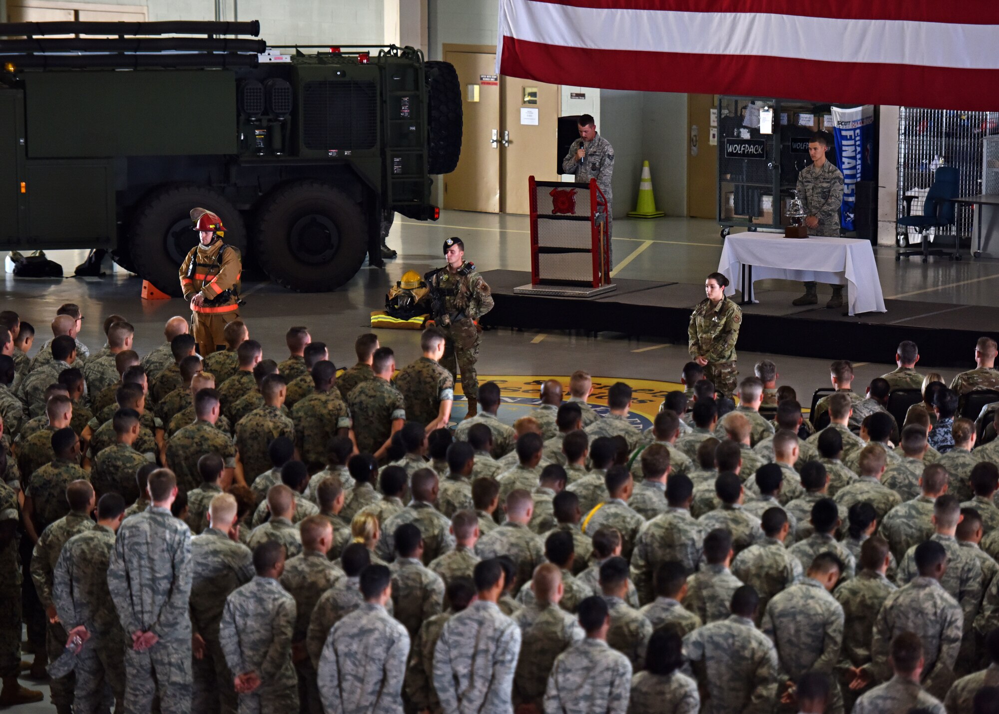 Students of the 312th Training Squadron stand in formation at the Firefighter Remembrance Ceremony in the Department of Defense Louis F. Garland Fire Academy on Goodfellow Air Force, Texas, Sept. 11, 2019. The 312th TRS trains, develops and inspires warriors to deliver fire emergence services for the Department of Defense and America’s international partners. (U.S. Air Force photo by Senior Airman Seraiah Wolf/Released)