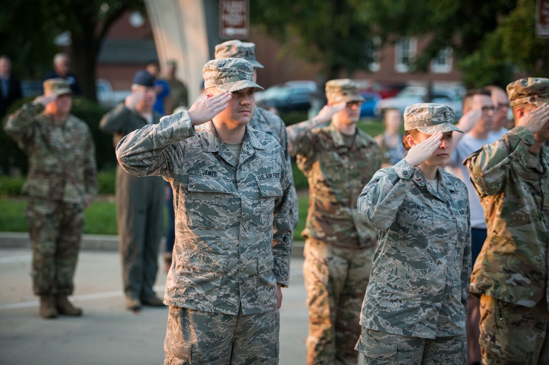 Staff Sgt. Ryan James, 932nd Mission Support Group, command support staff renders a salute during the Scott Air Force Base 9/11 Memorial Reveille, Sept. 11, 2019, Scott Air Force Base, Illinois. (U.S. Air Force photo by Master Sgt. Christopher Parr)
