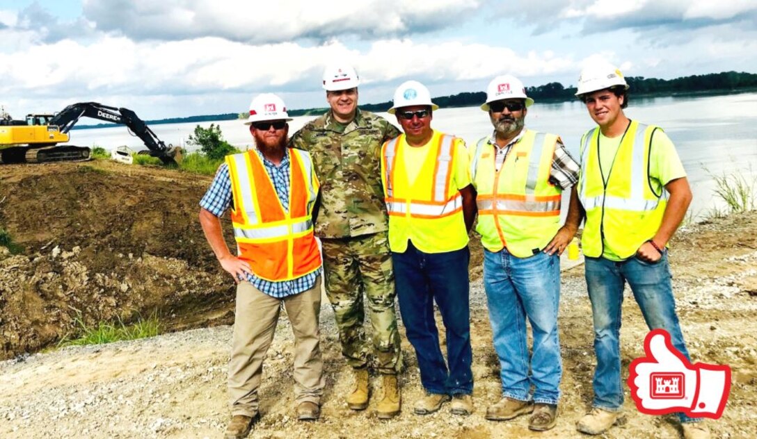 Group poses at Mound City jobsite