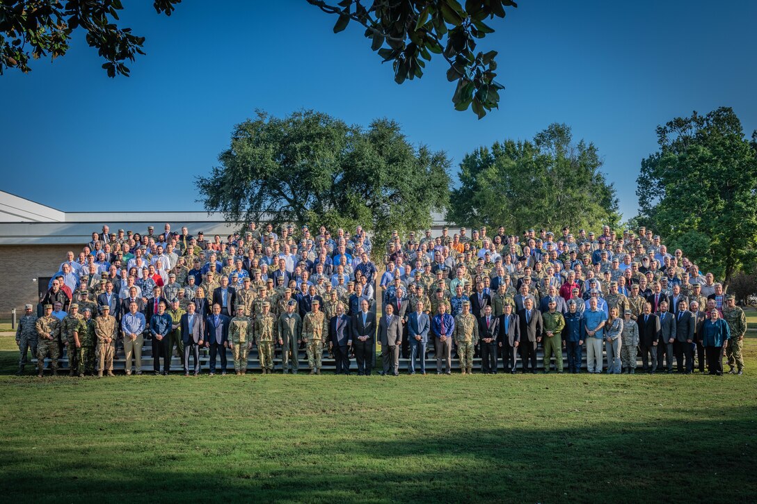 Gen. John W. “Jay” Raymond, United States Space Command and Air Force Space Command commander, stands with participants of Schriever Wargame 2019. More than 350 military and civilian experts from 27 agencies around the country, as well as Australia, Canada, New Zealand and the United Kingdom, participated in the wargame to explore multi-domain space operations. (U.S. Air Force photo by Trey Ward)