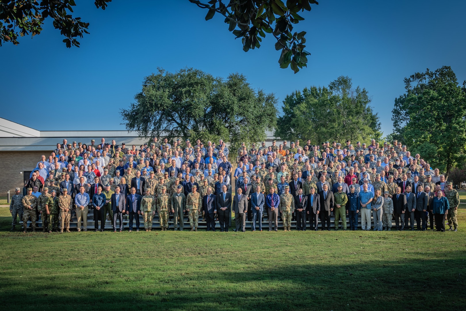 Gen. John W. “Jay” Raymond, United States Space Command and Air Force Space Command commander, stands with participants of Schriever Wargame 2019. More than 350 military and civilian experts from 27 agencies around the country, as well as Australia, Canada, New Zealand and the United Kingdom, participated in the wargame to explore multi-domain space operations. (U.S. Air Force photo by Trey Ward)