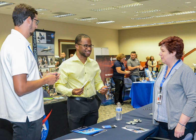 Team Edwards member Arman Johnson speaks with a local business representative during a Spouse Employment Job Fair at the Airmen and Family Readiness Center on Edwards Air Force Base, California, Sept. 13. (U.S. Air Force photo by Giancarlo Casem)