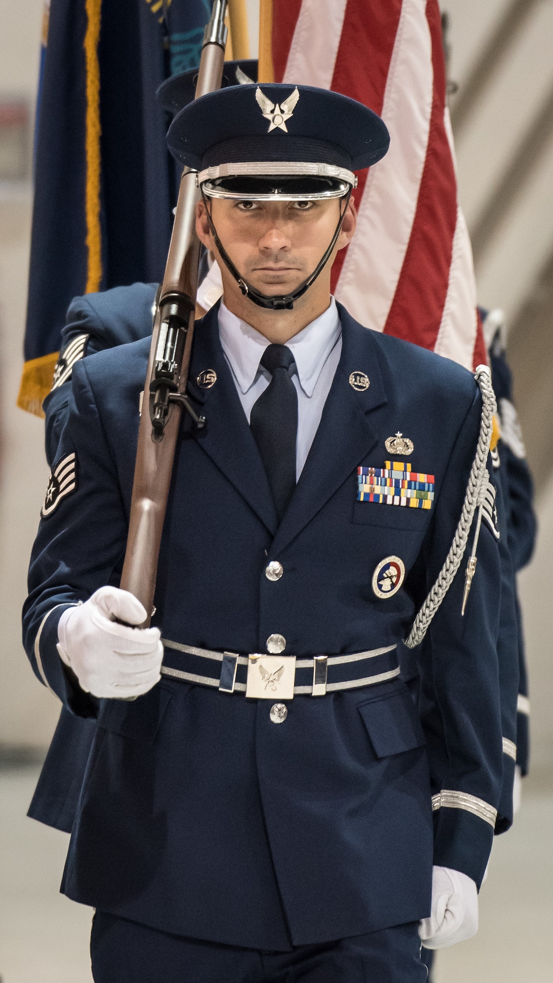 The 123rd Airlift Wing Honor Guard presents the colors during a ceremony at the Kentucky Air National Guard Base in Louisville, Ky, Aug.13, 2019, to bestow the Air Force Cross on Tech. Sgt. Daniel Keller, a combat controller in the 123rd Special Tactics Squadron. Keller earned the medal for valor on the battlefield in Afghanistan. (U.S. Air National Guard photo by Dale Greer)