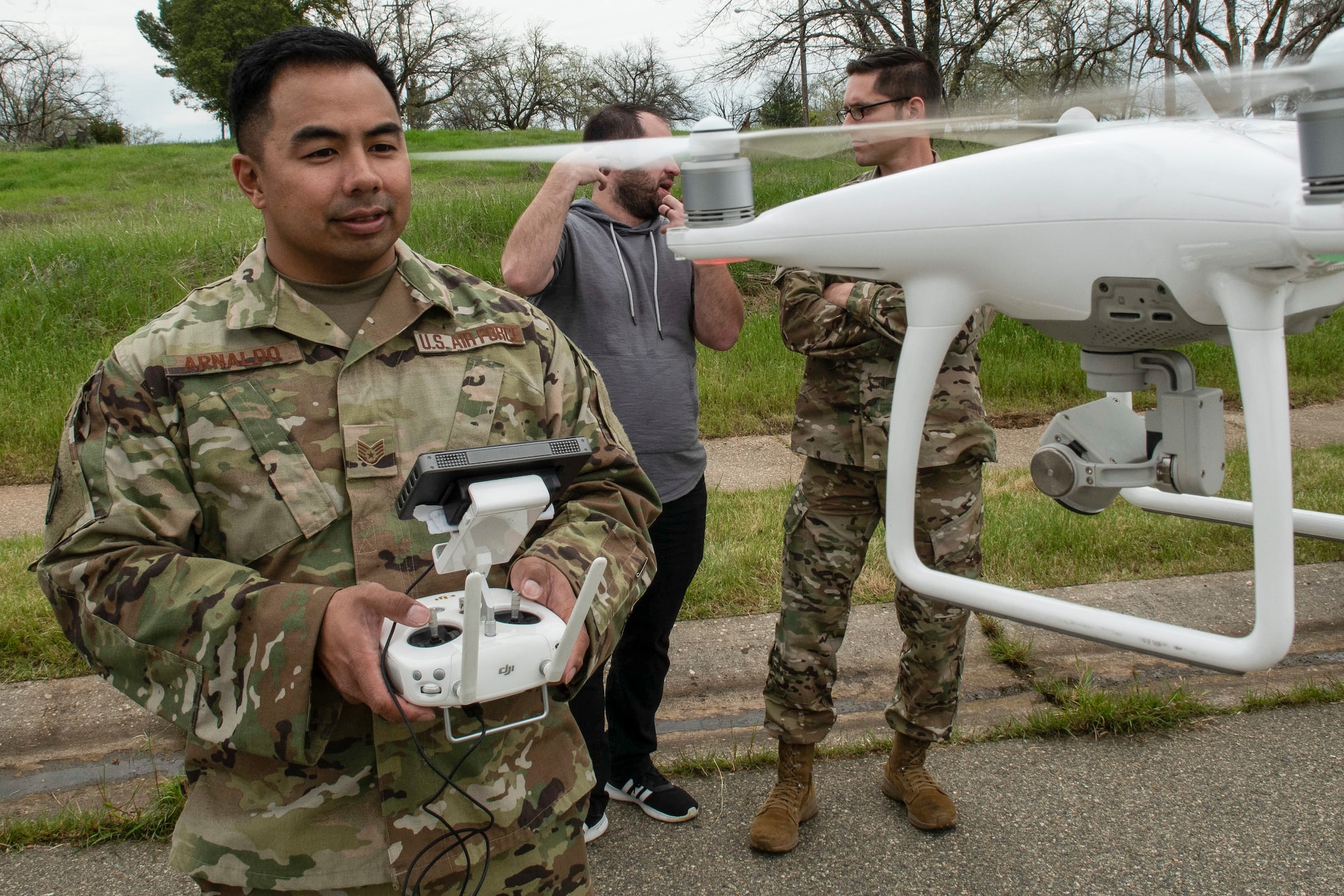 U.S. Air Force Staff Sgt. Francis Arnaldo, 9th Security Forces Squadron resource protection NCO in charge, flies a drone while testing out the Hivemapper program capabilities at Beale Air Force Base, California, April 12, 2019. Beale is currently the first base to beta-test the Hivemapper program, a drone capability that records and senses change detection. (U.S. Air Force photo by Tech. Sgt. Veronica Montes)