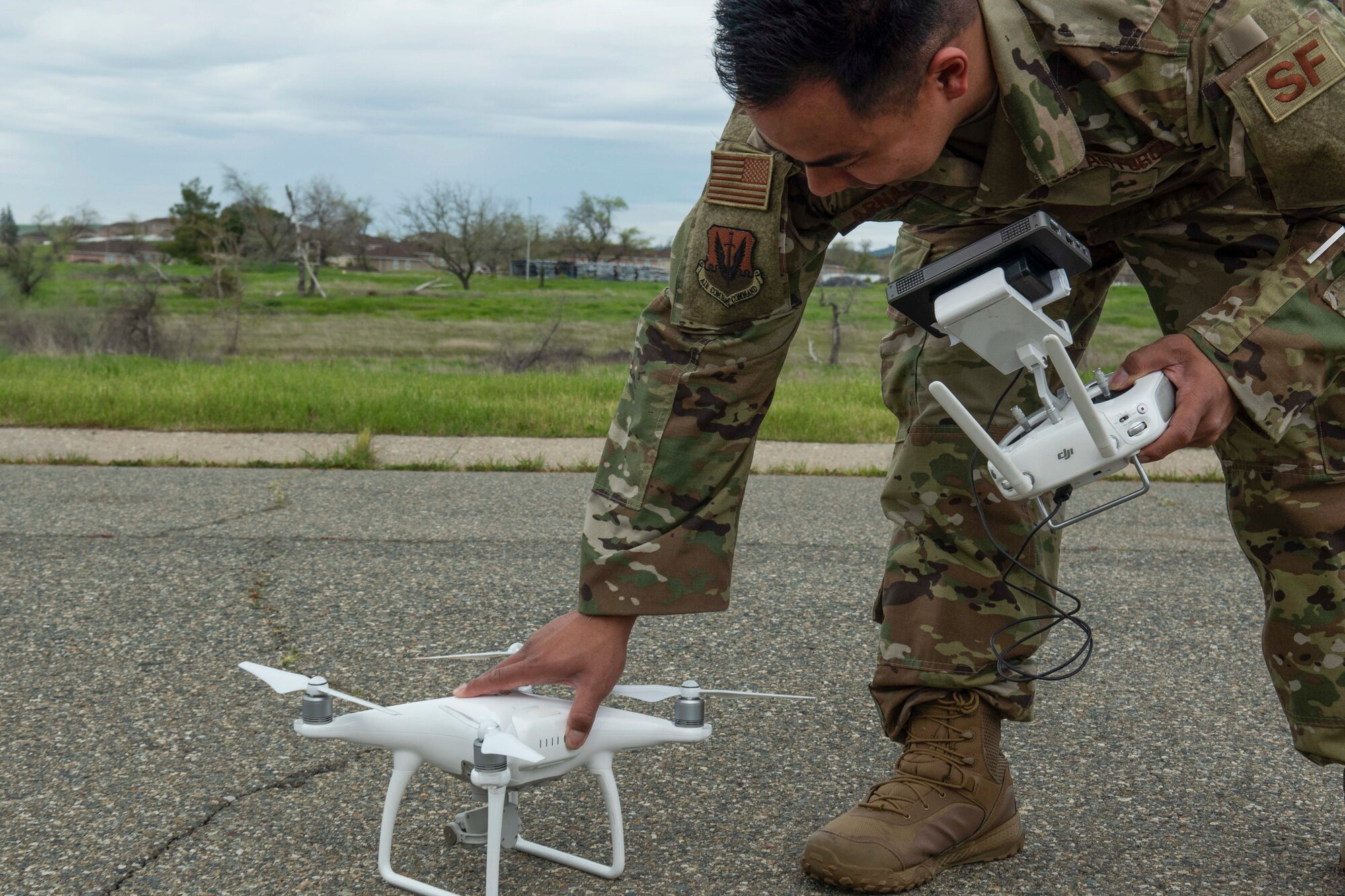 U.S. Air Force Staff Sgt. Staff Sgt. Francis Arnaldo, 9th Security Forces Squadron resource protection NCO in charge, prepares a drone while testing out the Hivemapper program capabilities at Beale Air Force Base, California, April 12, 2019. Beale members have partnered with the Hivemapper team since late 2018, to utilize the program as a way to same time, money, and manpower, while improving defense capabilities. (U.S. Air Force photo by Tech. Sgt. Veronica Montes)