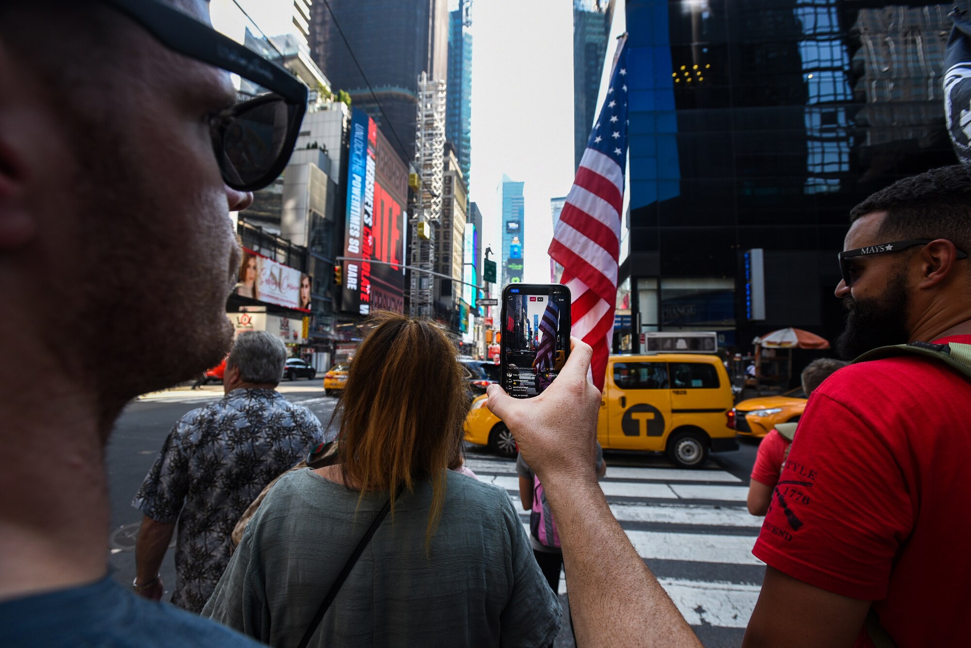 U.S. Air Force Maj. Jon Leetch, Columbus Air Force Base, Miss. 41st Flying Training Squadron instructor pilot, Facebook Lives the final minutes of a 100 mile ruck in New York City Sept. 11, 2019. The ruck is held every year to honor the 2,977 people killed during the attacks of 9/11. The event started on Joint Base McGuire-Dix-Lakehurst, New Jersey and ended at ground zero while participants carry an American Flag and a prisoner of war/missing in action flag to commemorate the day. (U.S. Air Force photo by Airman 1st Class Ariel Owings)