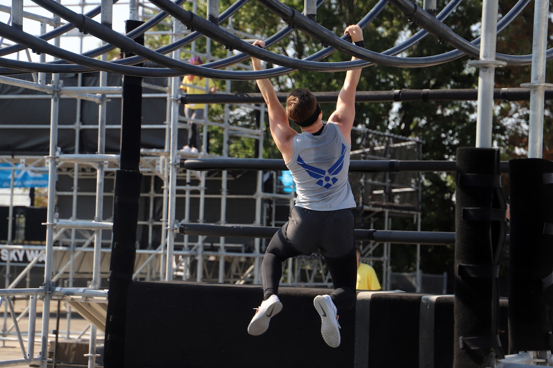 U.S. Air Force 2nd Lt. Michelle Strickland tackles an obstacle at the Alpha Warrior Proving Ground, Selma, Texas, during the 2019 Inter-Service Battle Sept. 14, 2019. Strickland had the fastest female time (25 minutes, 5 seconds) on the course helping to lead the Air Force to victory over the U.S. Army and U.S. Navy. (U.S. Air Force photo by Victoria Ribiero)