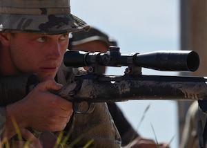 Senior Airman Dillion Bruce, 90th Security Support Squadron tactical response force member, sets up his final shot at the Nuclear Advanced Designated Marksman course, at Camp Guernsey, Wyo., Sept. 29, 2019. For their final shot, students had two minutes to get into position, estimate target range, adjust for external factors and hit a stationary hostile target within one degree of friendly forces. (U.S. Air Force photo by Staff Sgt. Ashley N. Sokolov)