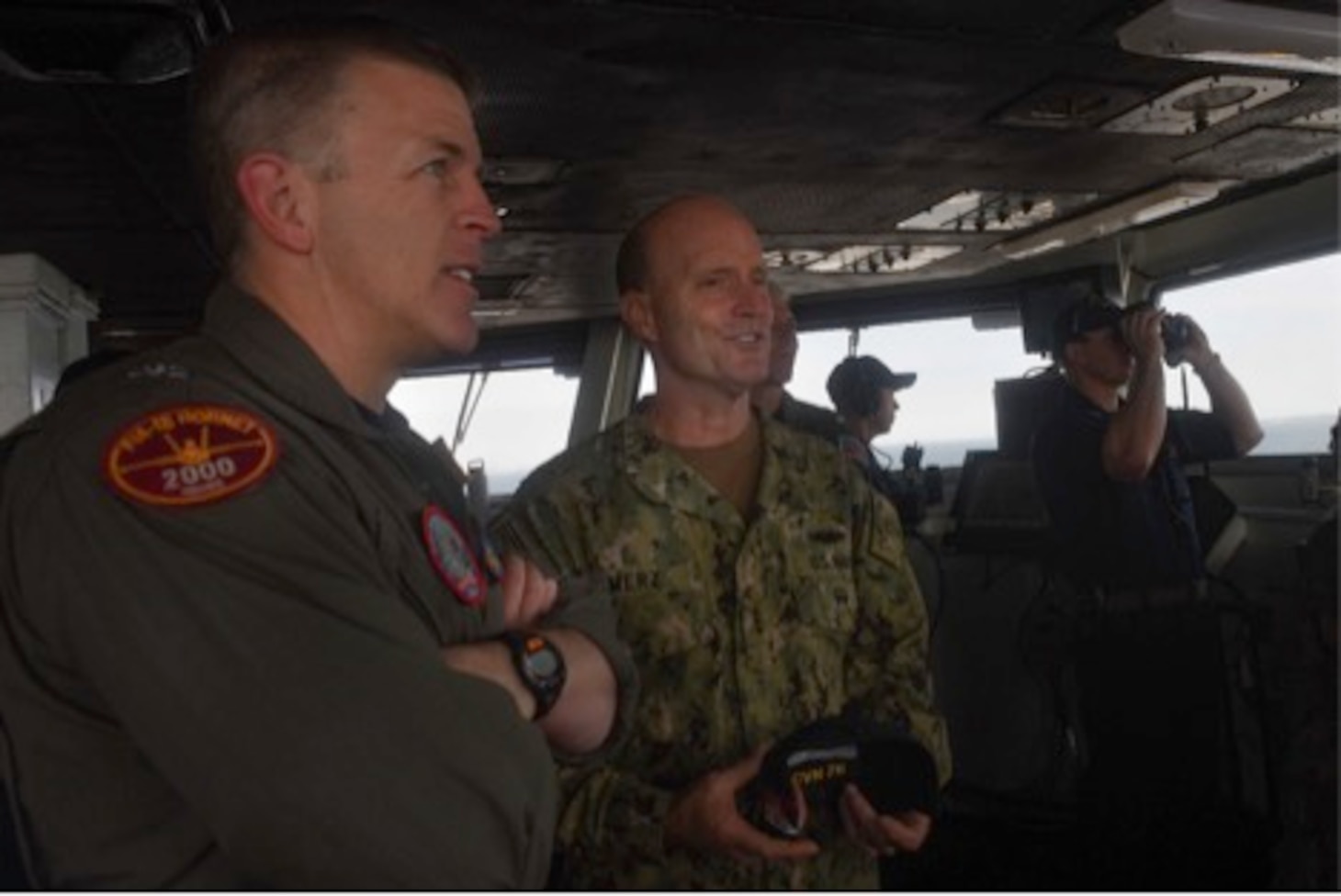 PHILIPPINE SEA (September 14, 2019) Vice Adm. William R. Merz, Commander, 7th Fleet, speaks with Capt. Pat Hannifin, the commanding officer of the Navy’s forward-deployed aircraft carrier USS Ronald Reagan (CVN 76), while touring the Reagan. USS Ronald Reagan, the flagship of Carrier Strike Group 5, provides a combat-ready force that protects and defends the collective maritime interests of its allies and partners in the Indo-Asia-Pacific region.