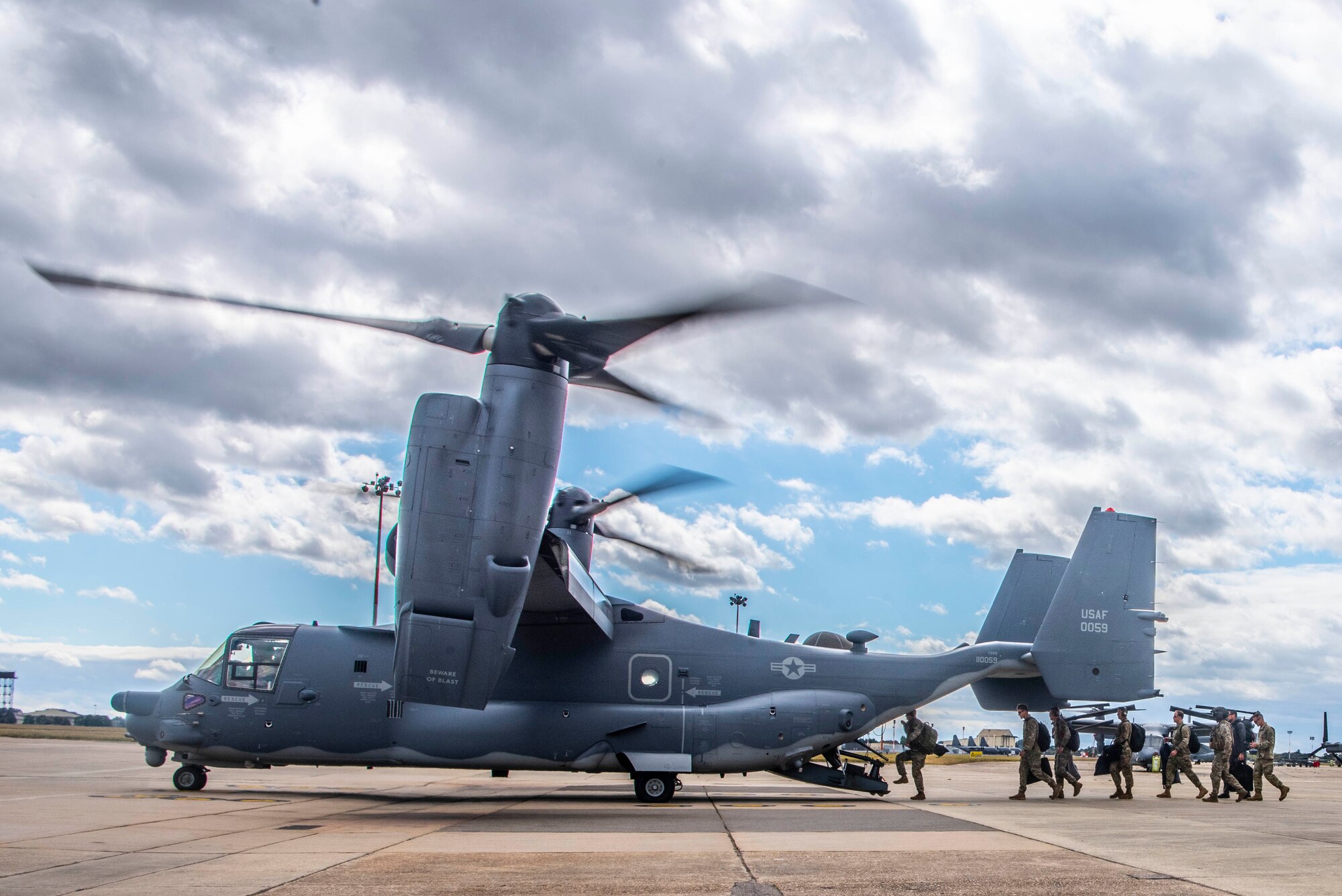 U.S. Army Gen. Richard D. Clarke, United States Special Operations Command commander, and his team board a U.S. Air Force CV-22B Osprey from the 352nd Special Operations Wing at RAF Mildenhall, England, Sept. 12, 2019. The mission of the 352nd SOW, part of Air Force Special Operations Command, is to provide combat ready, responsive, specialized airpower and combat support to execute the full spectrum of SOF missions. (U.S. Air Force photo by Airman 1st Class Joseph Barron)