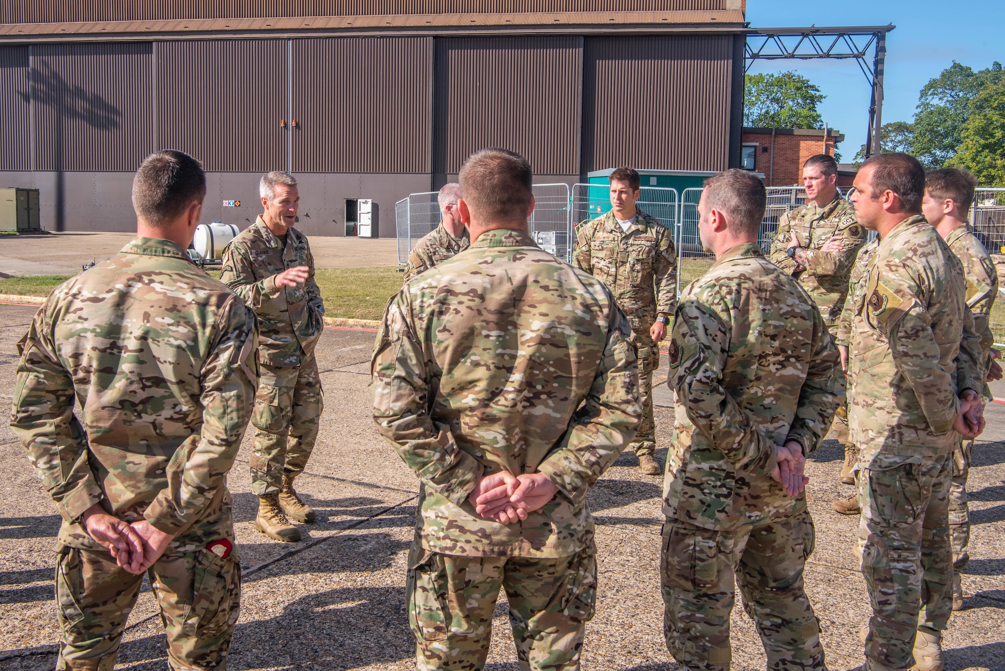 U.S. Army Gen. Richard D. Clarke, United States Special Operations Command commander, speaks with 352nd Special Operations Wing special tactics operators at RAF Mildehall, England, Sept. 12, 2019. The mission of the 352nd SOW, part of Air Force Special Operations Command, is to provide combat ready, responsive, specialized airpower and combat support to execute the full spectrum of SOF missions. (U.S. Air Force photo by Airman 1st Class Joseph Barron)