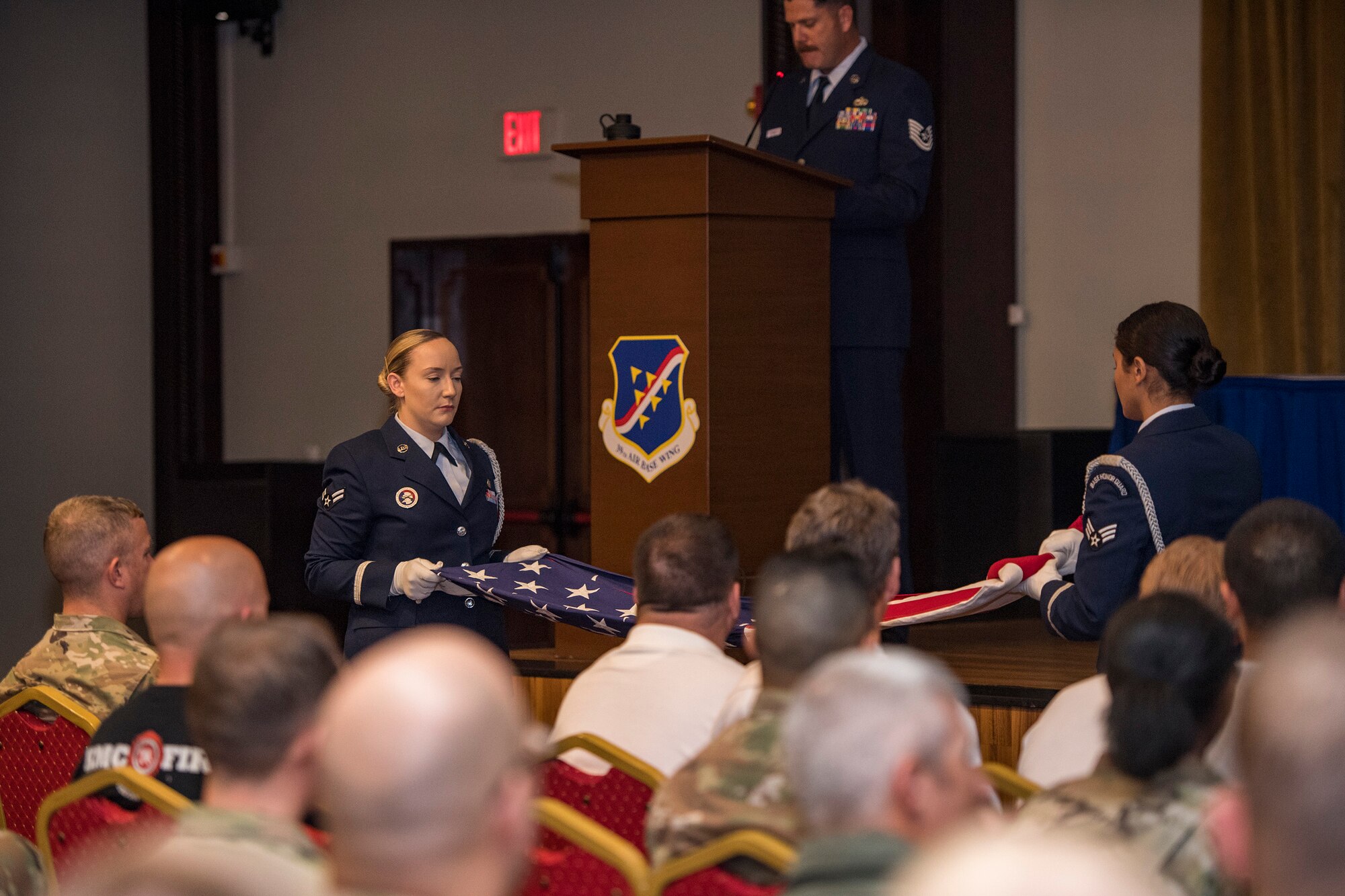 Members of the 39th Air Base Wing Honor Guard perform a ceremonial flag fold during a 9/11 remembrance ceremony Sept. 11, 2019, at Incirlik Air Base, Turkey. Honor Guardsmen ceremonially folded the flag 13 times to create the shape of a cocked hat in honor of the lives lost during the 9/11 terrorists attacks. (U.S. Air Force photo by Staff Sgt. Ceaira Tinsley)