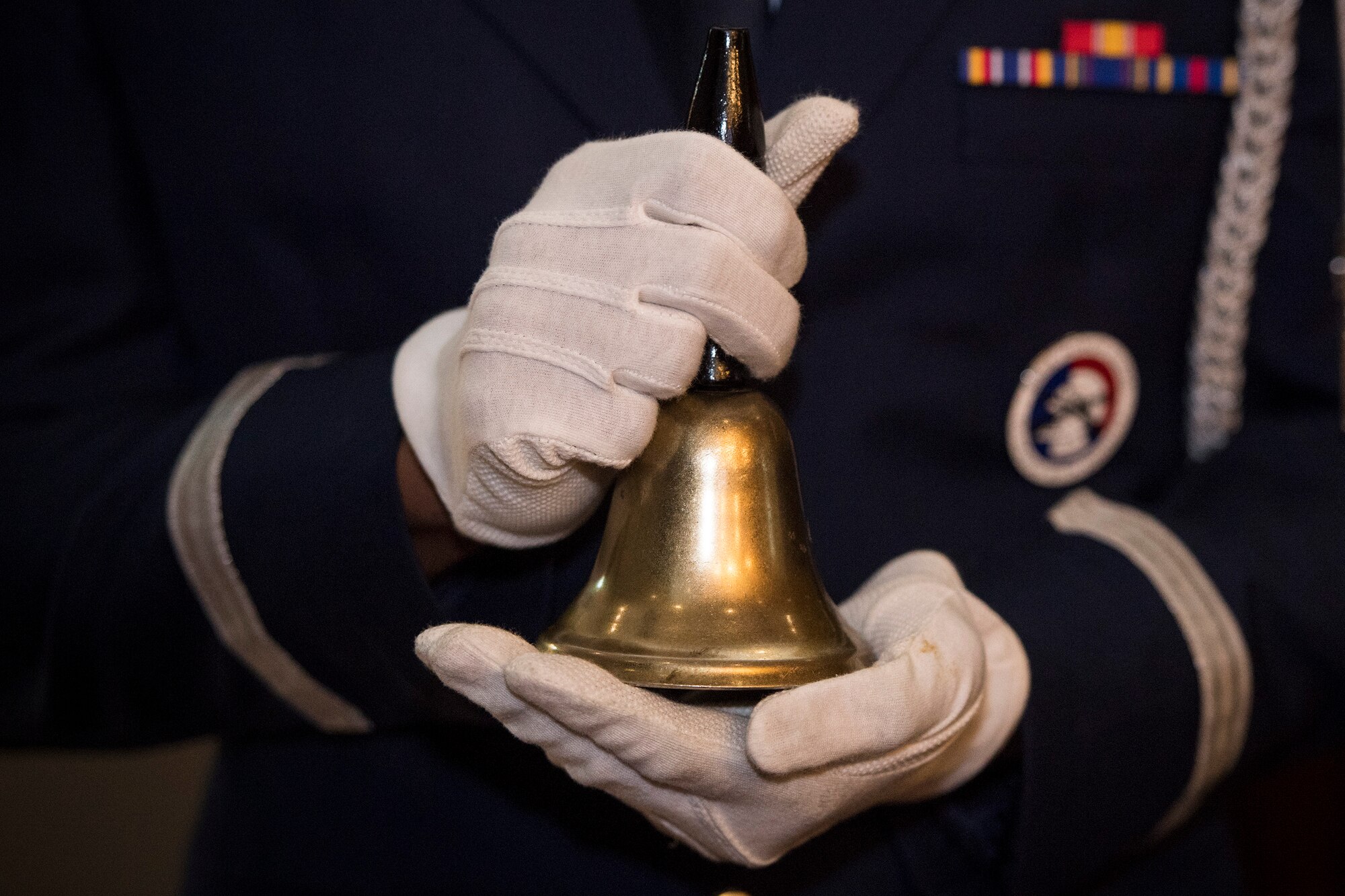 A ceremonial bell is seen during a 9/11 remembrance ceremony Sept. 11, 2019, at Incirlik Air Base, Turkey. The first set of rings represented the call to duty, the second set represented the completion of duty and the final set represented the members who are coming home. (U.S. Air Force photo by Staff Sgt. Ceaira Tinsley)